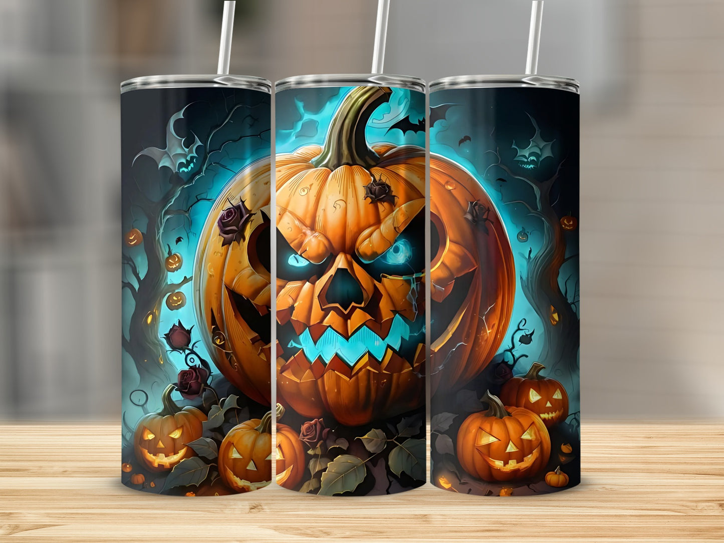 Three tumblers with a spooky Halloween jack-o'-lantern and bat design.
