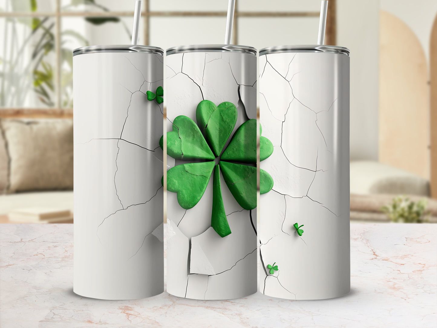 Three white tumblers with cracked surface design and green shamrocks.