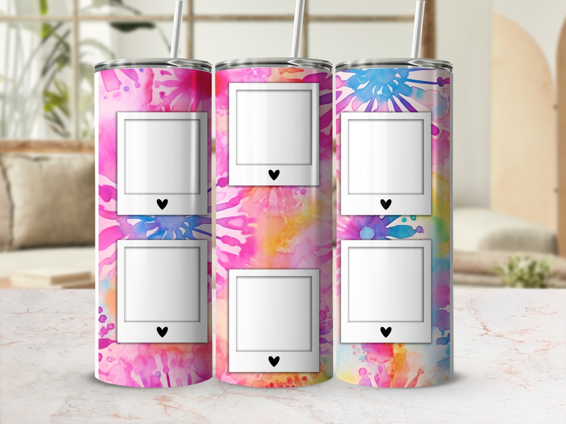 Three tumblers with colorful watercolor splashes and blank photo frames.