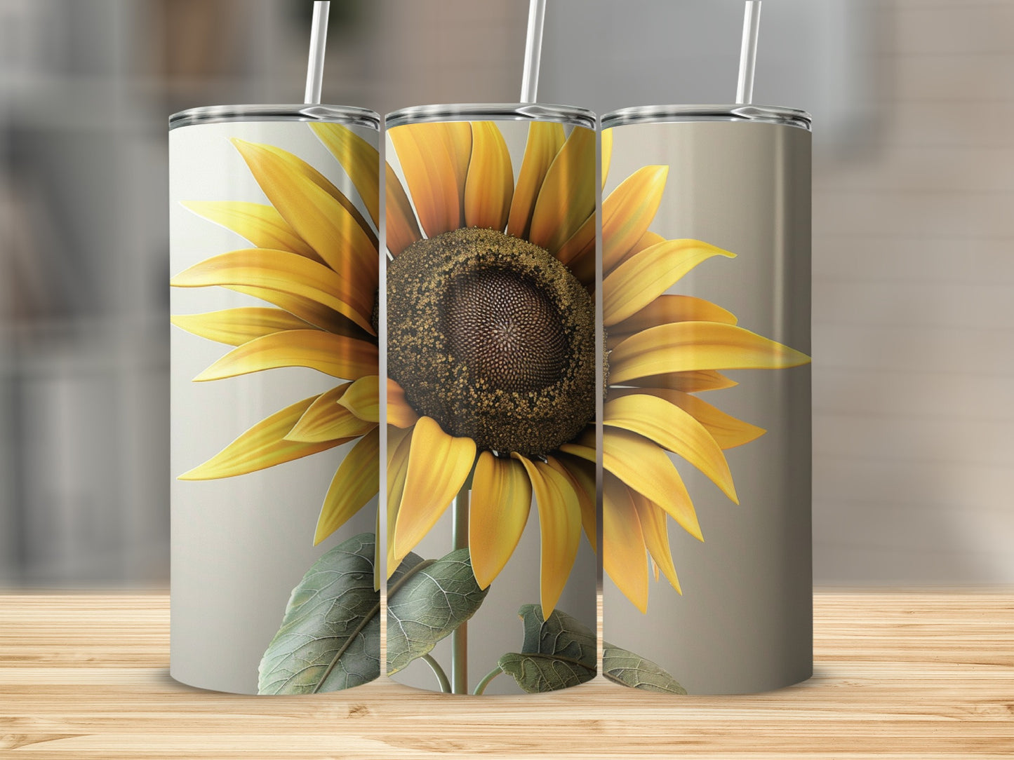 Three tumblers featuring a detailed sunflower design.