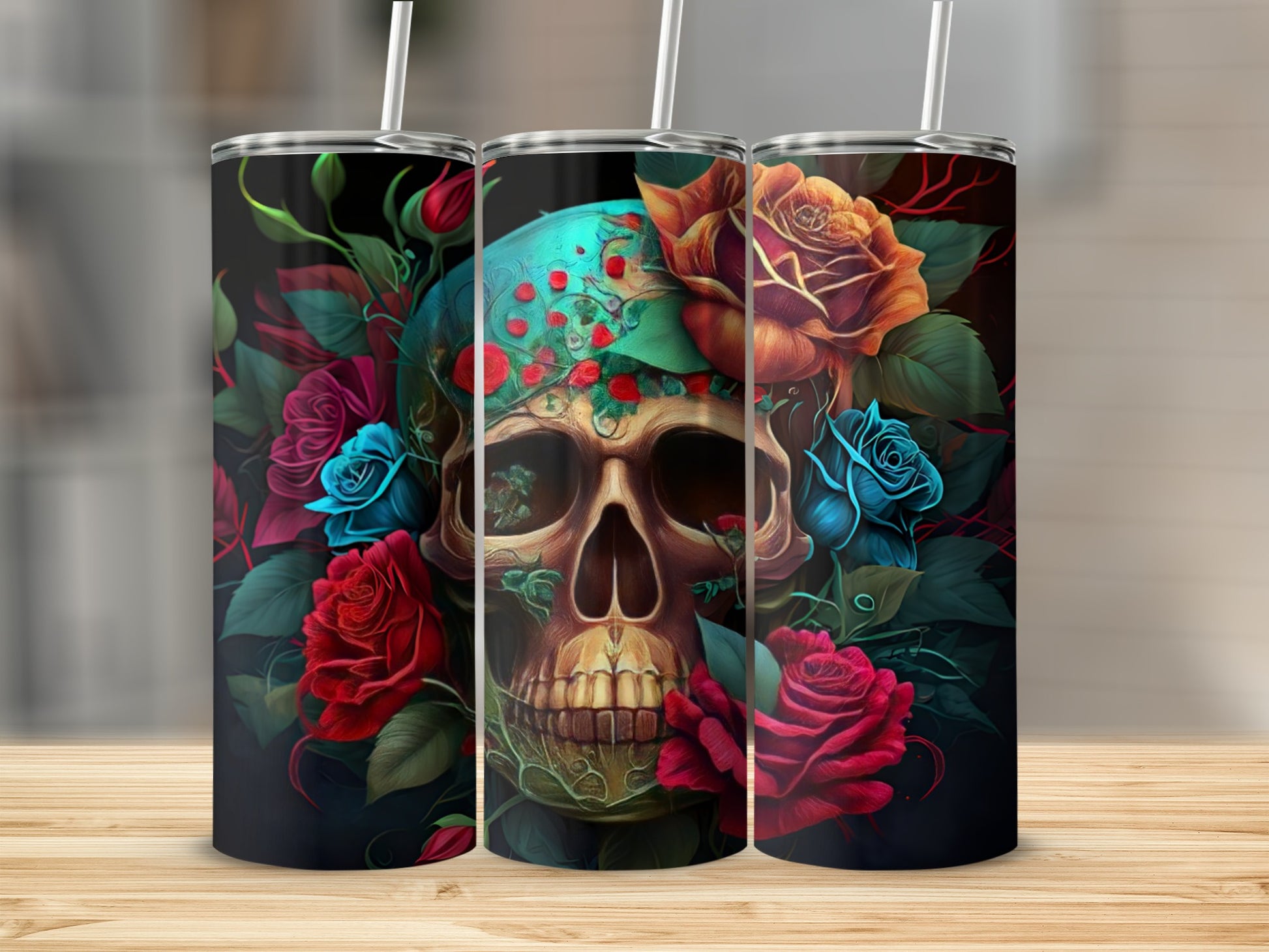 Three tumblers featuring a skull surrounded by colorful roses and foliage.