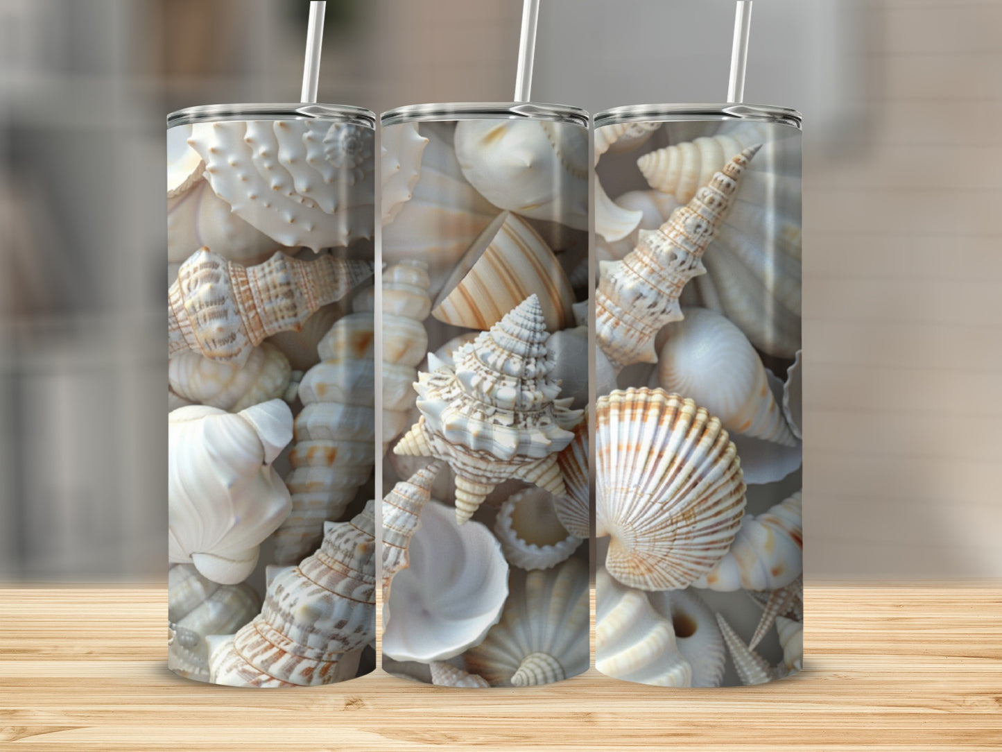 Close-up of three tumblers filled with various white and beige seashells.