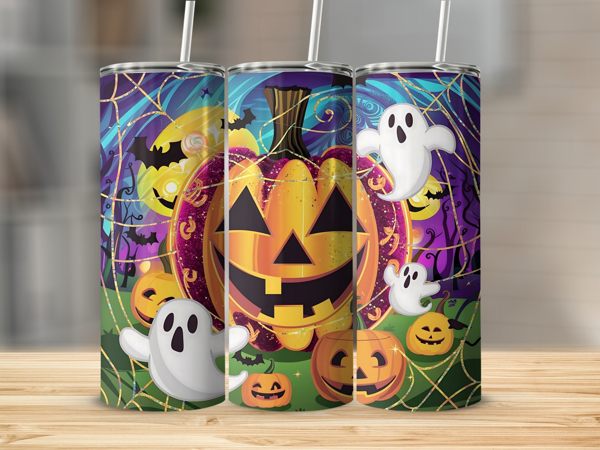Halloween tumblers with jack-o'-lanterns, ghosts, bats, and spiderwebs.
