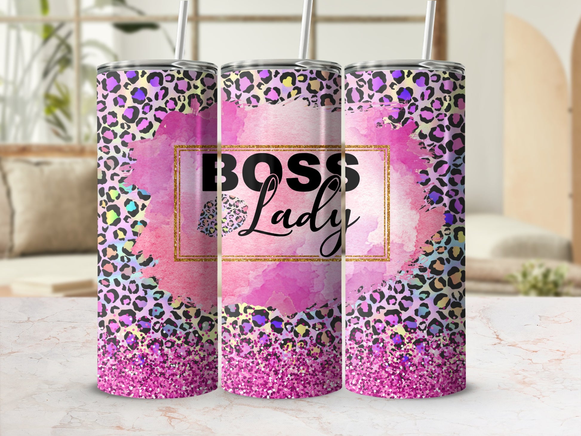Leopard print tumbler with "Boss Lady" text on pink watercolor background.