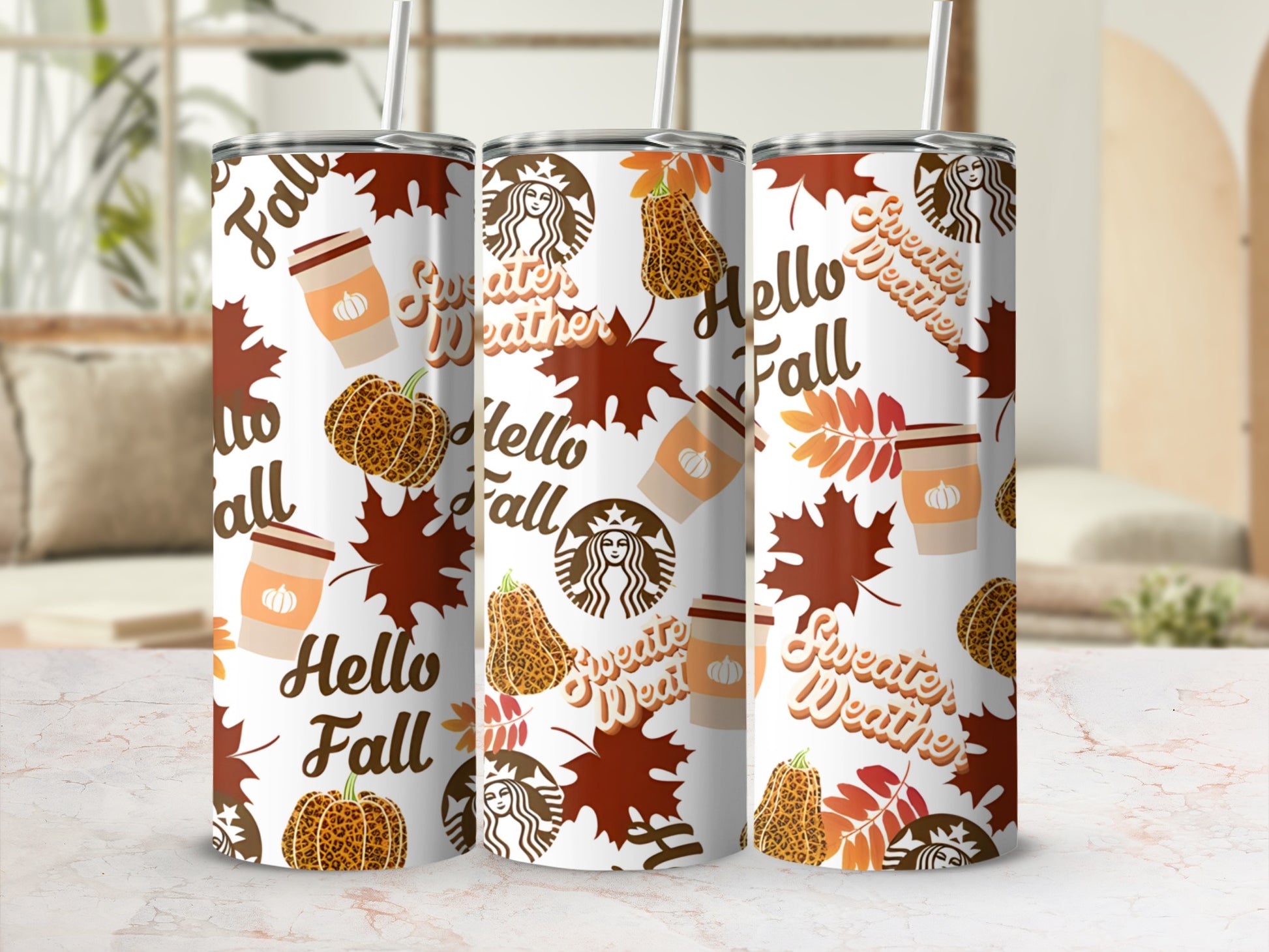 Fall themed tumbler with pumpkin, leaf, and coffee cup graphics.