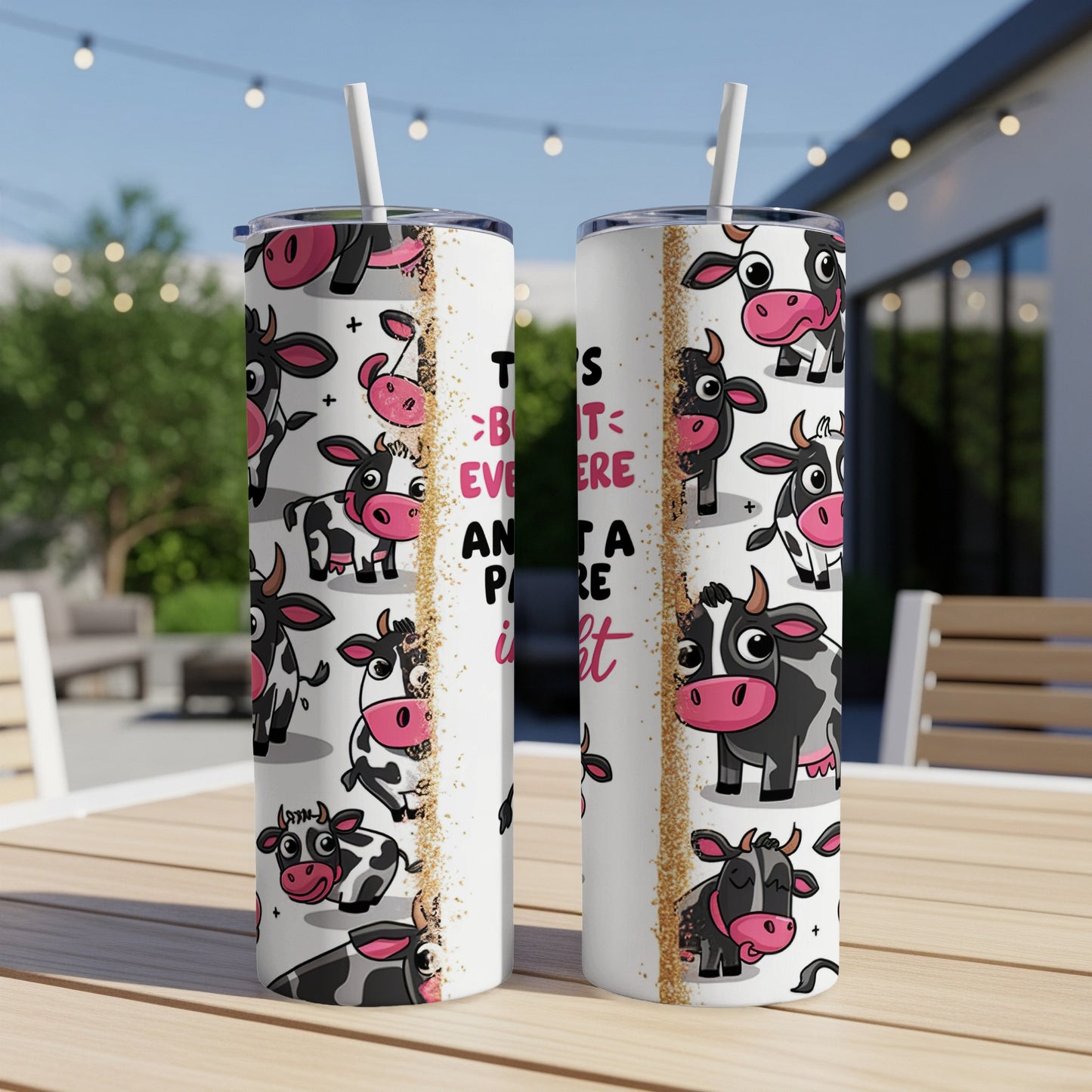 Cow pattern tumbler with "This year is better and a little bit moo-re" text.
