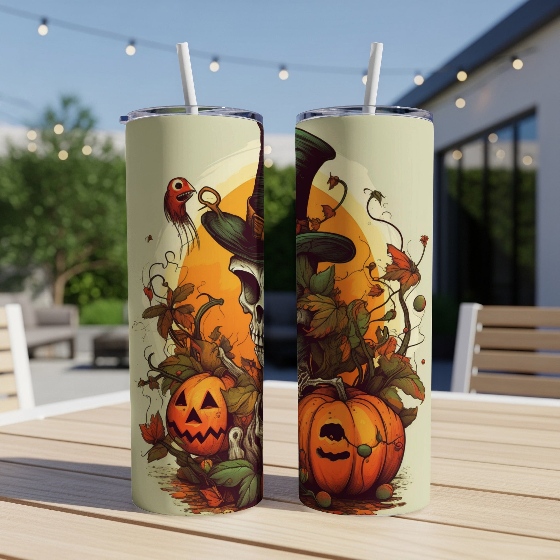 Two tumblers featuring a skull in a hat, pumpkins, and spooky Halloween foliage.