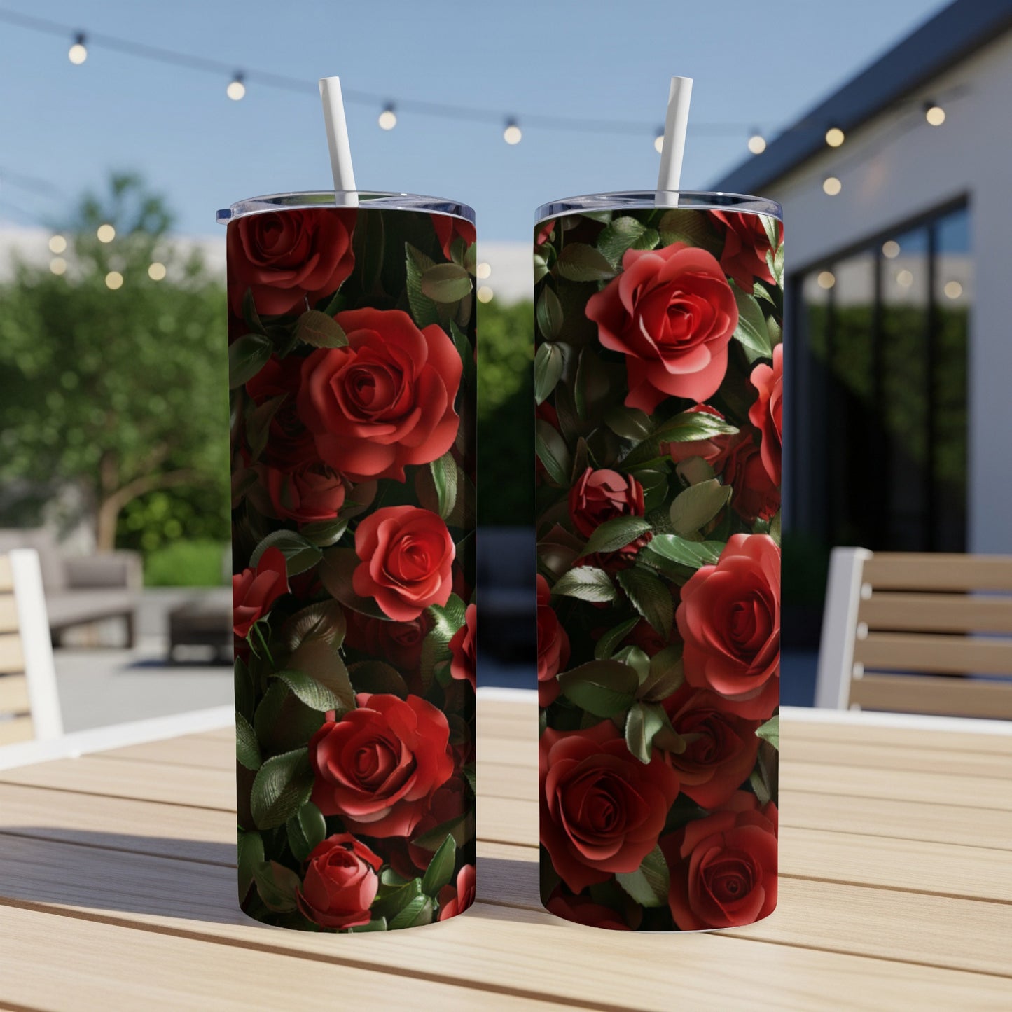 Two tall tumblers with a dense, all-over red rose floral pattern.