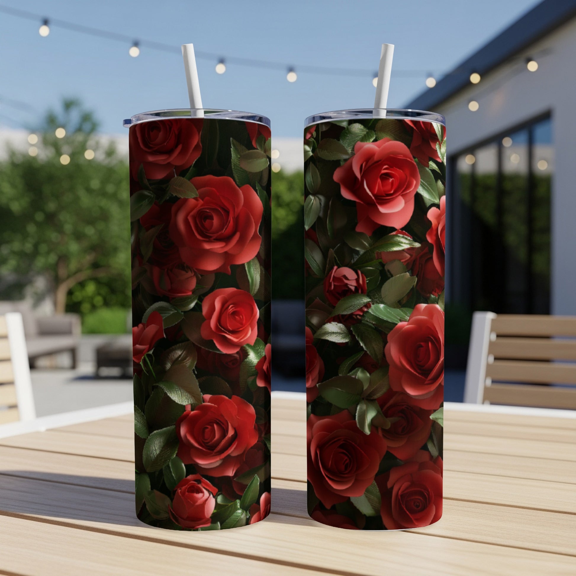 Two tall tumblers with a dense, all-over red rose floral pattern.