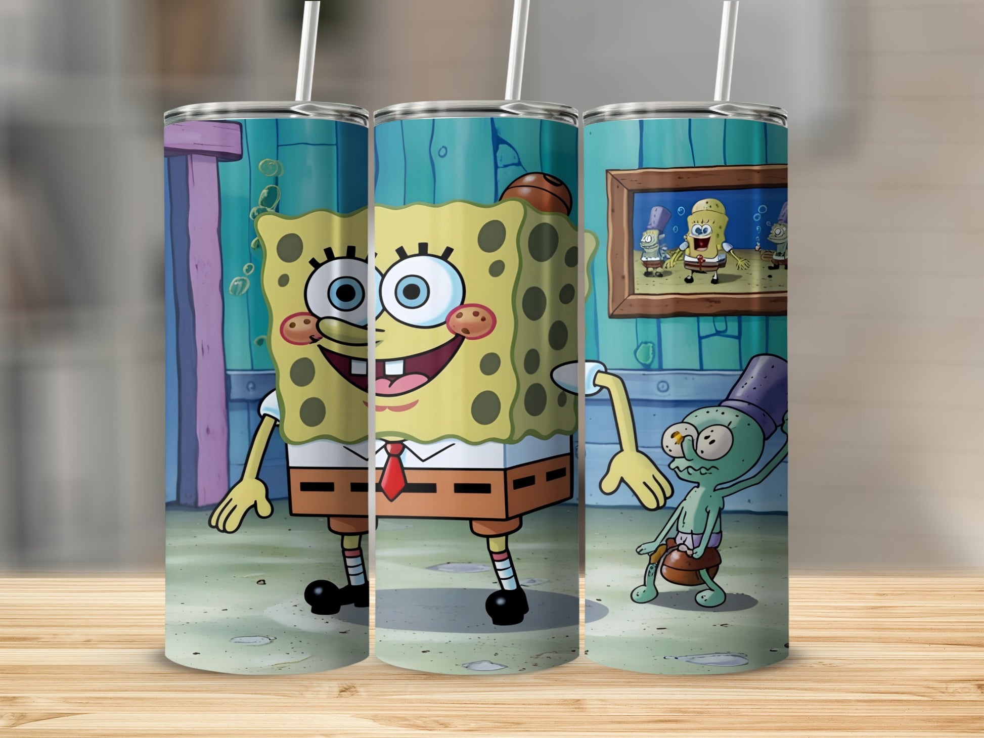 SpongeBob SquarePants and Squidward Tentacles on a tumbler with wood background.