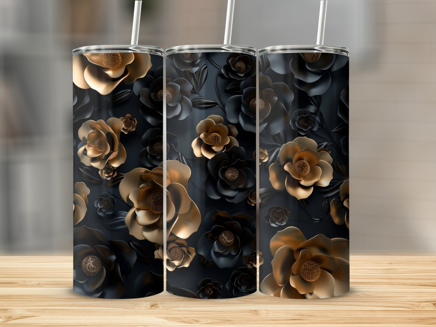Three tumblers with a dark floral pattern featuring gold and black roses.
