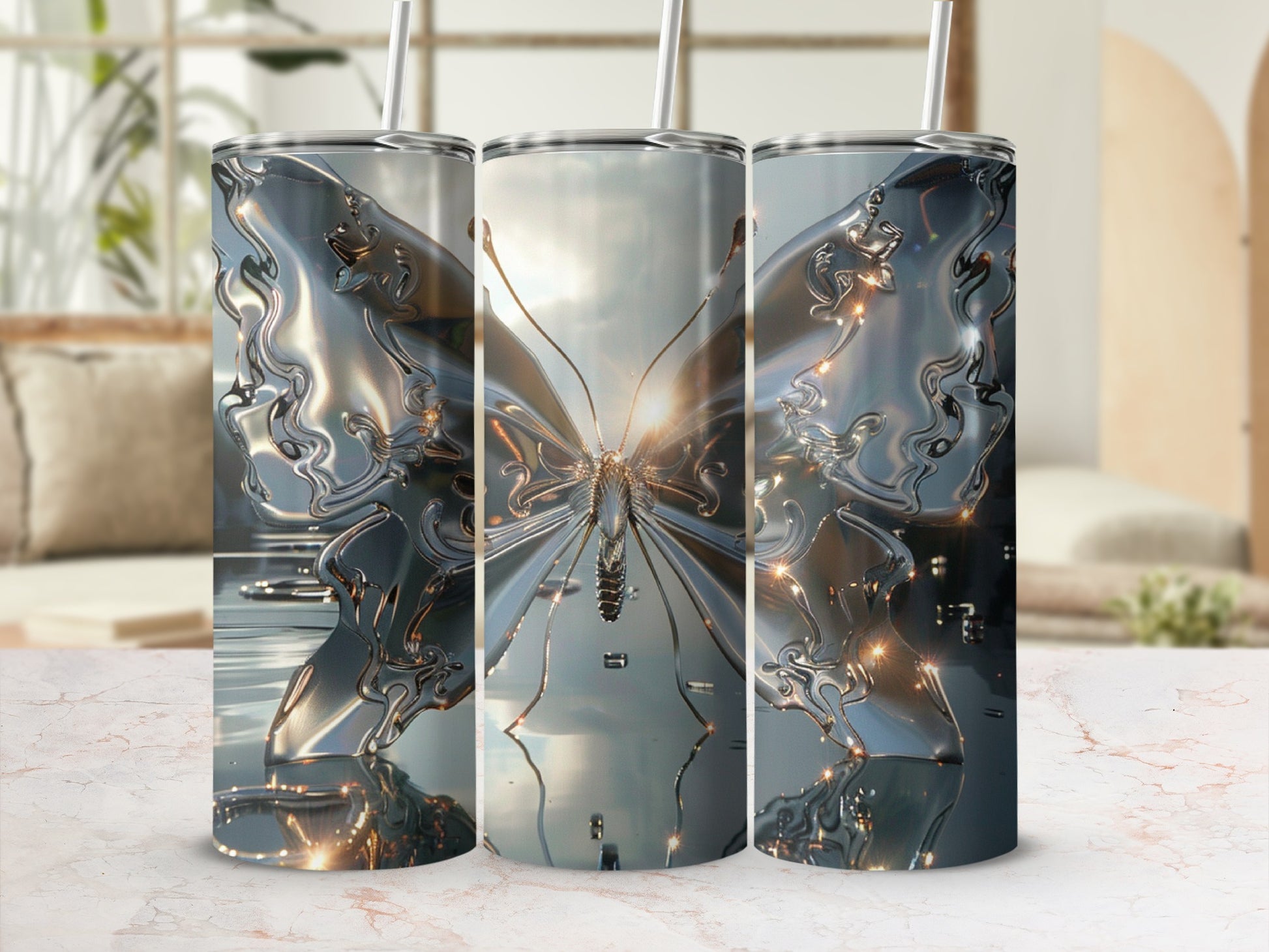Silver butterfly design on a insulated tumbler with straws.