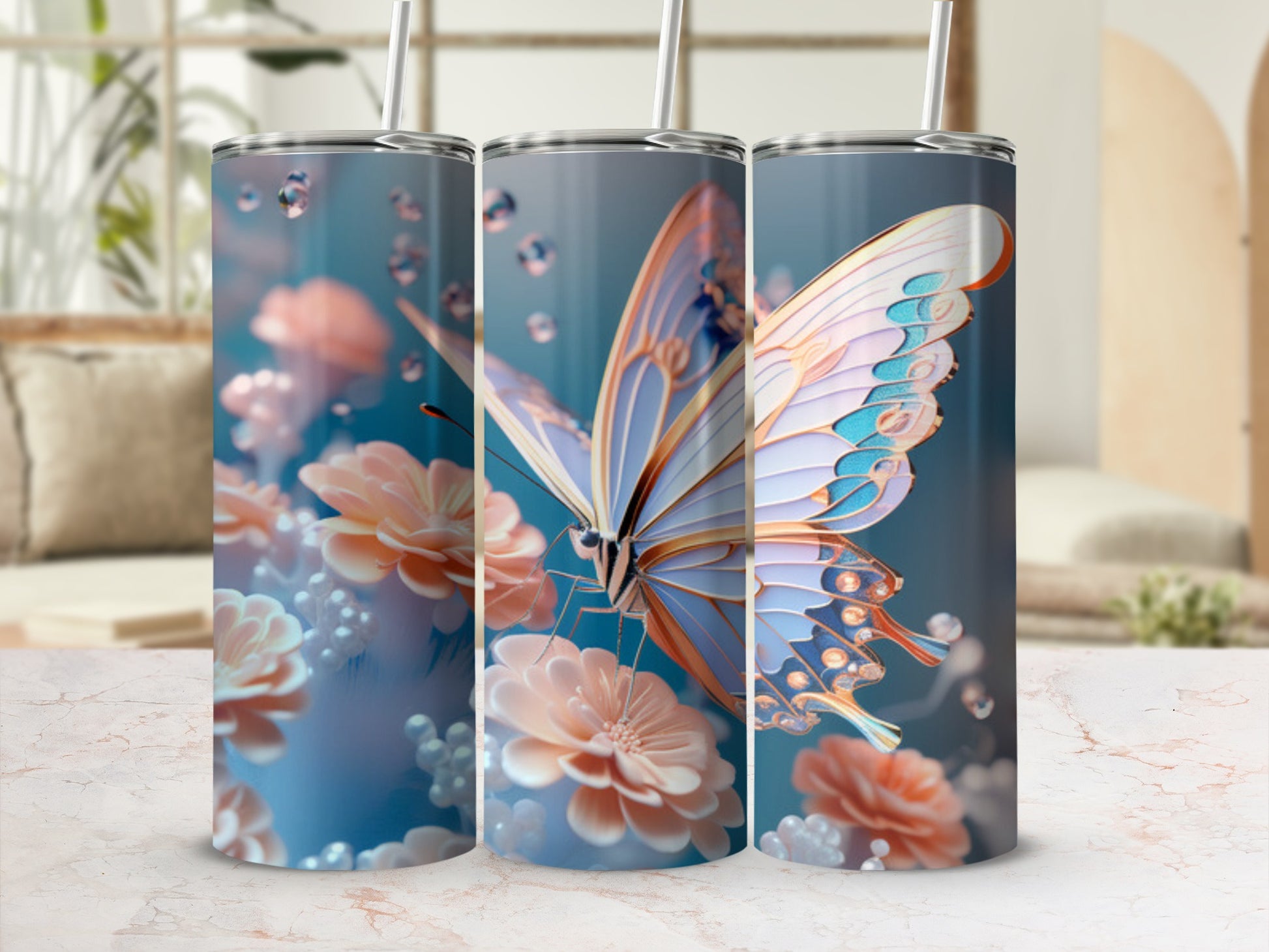 Three skinny tumblers with a butterfly and floral design.