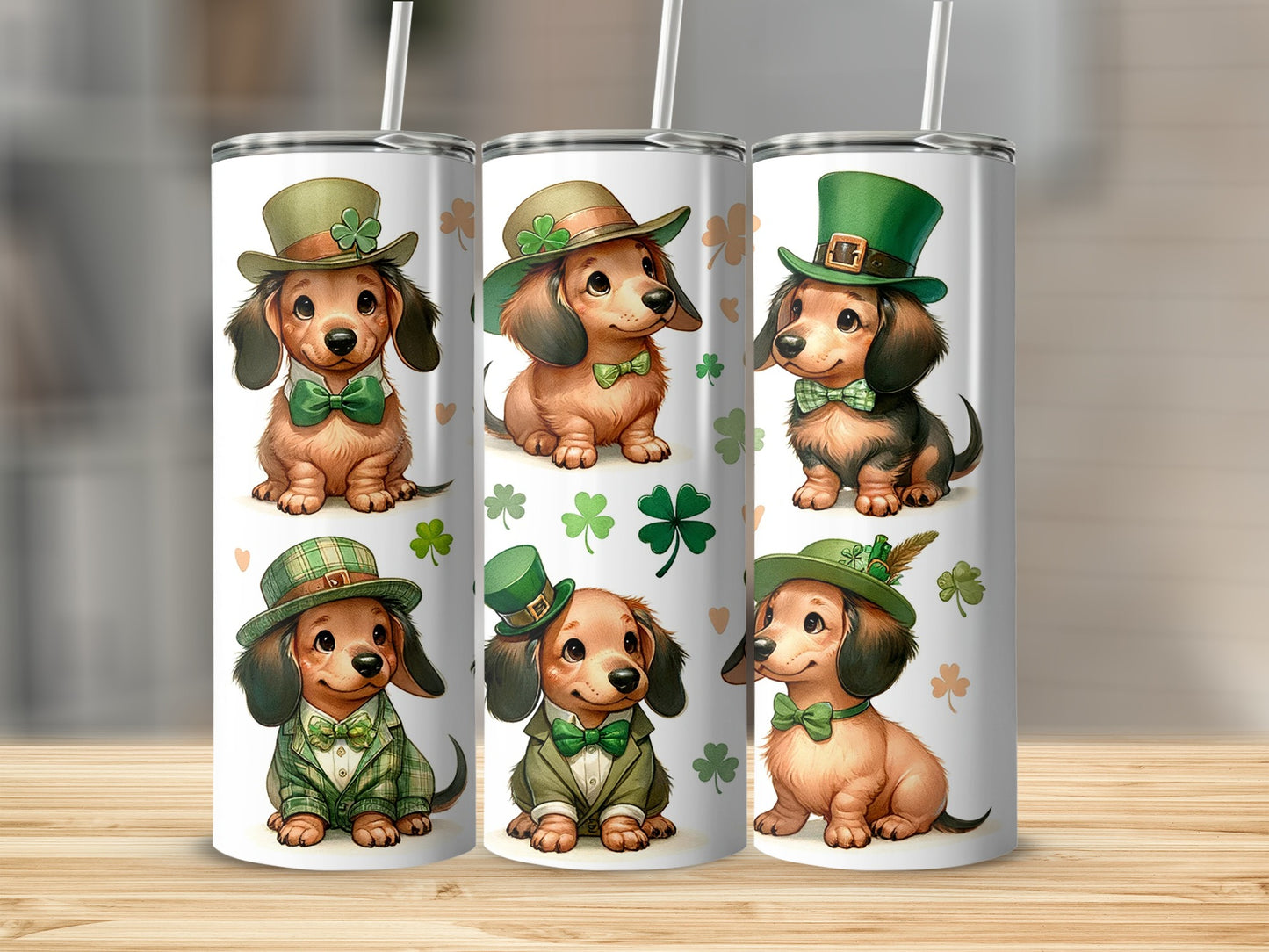 Three St. Patrick's Day themed dachshund tumblers with shamrocks and green hats.
