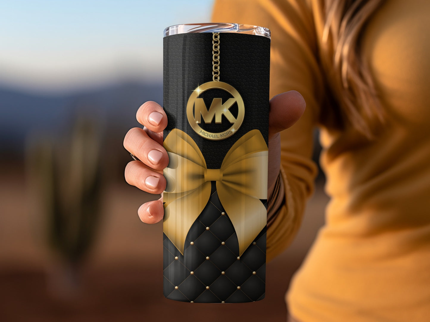 Elegant MK Branded Black and Gold Tumbler