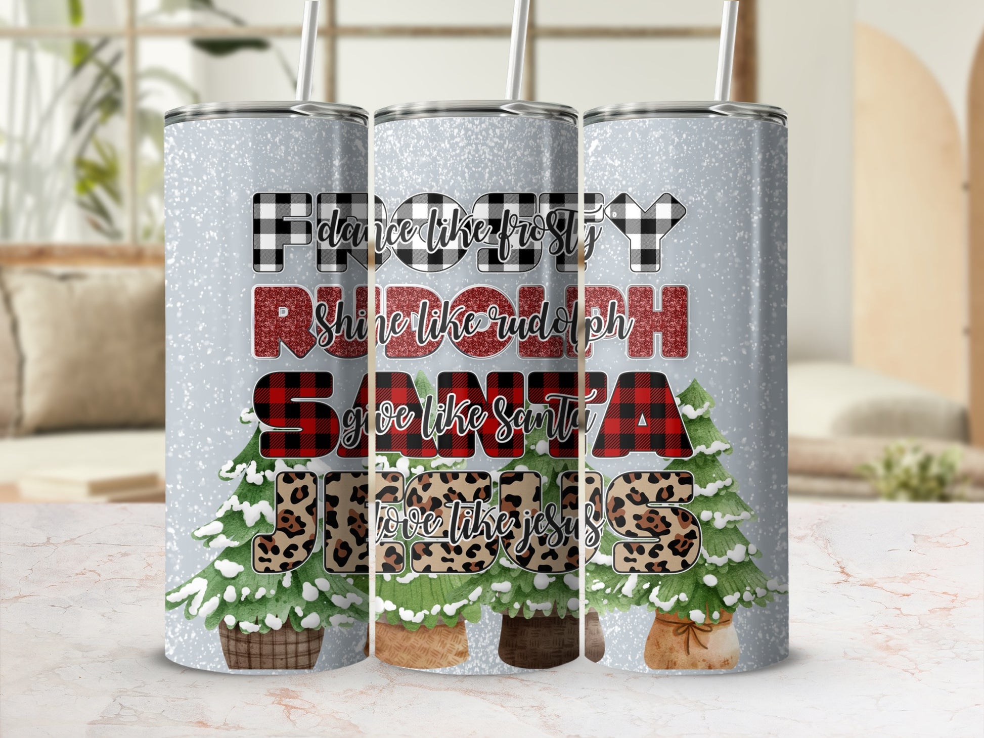 "Frosted" tumbler with trees and "Rudolph" text.