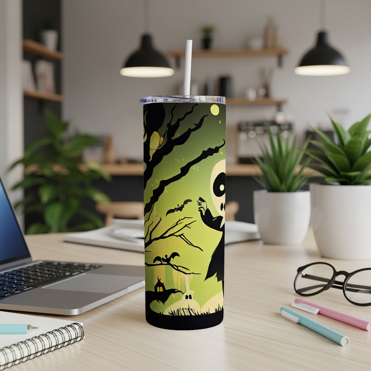 Halloween tumbler with a spooky ghost and haunted house design.