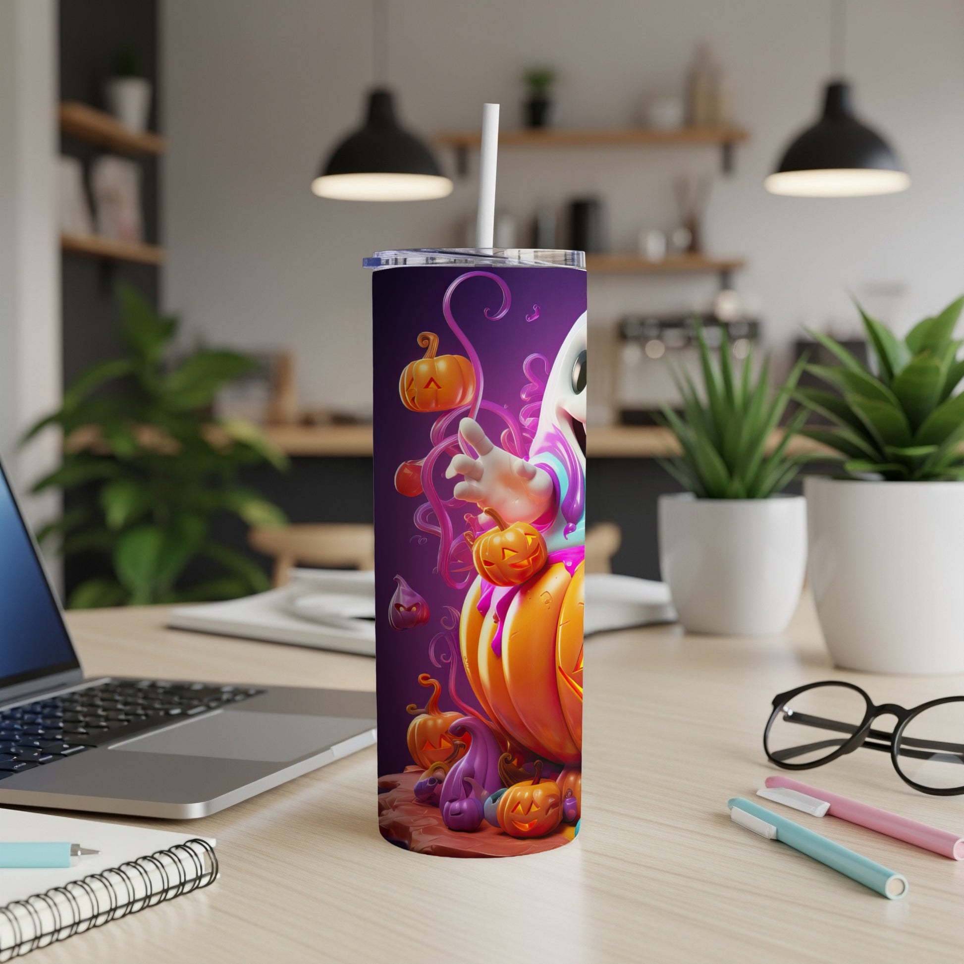 Purple tumbler with cartoon ghost, pumpkins, and swirls.