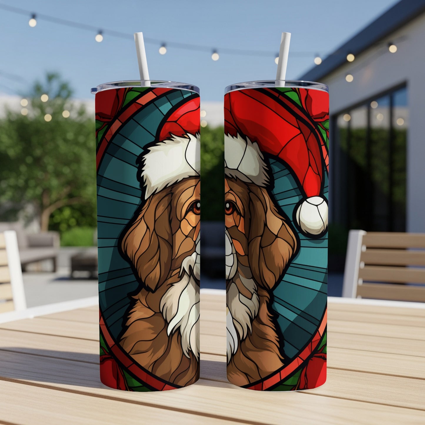 Two tumblers with a stained-glass dog wearing a Santa hat.