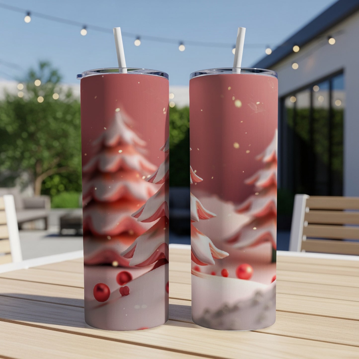 Two slim tumblers with festive red and white stylized Christmas trees.