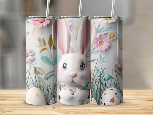 Three Easter-themed tumblers with bunny and floral designs.