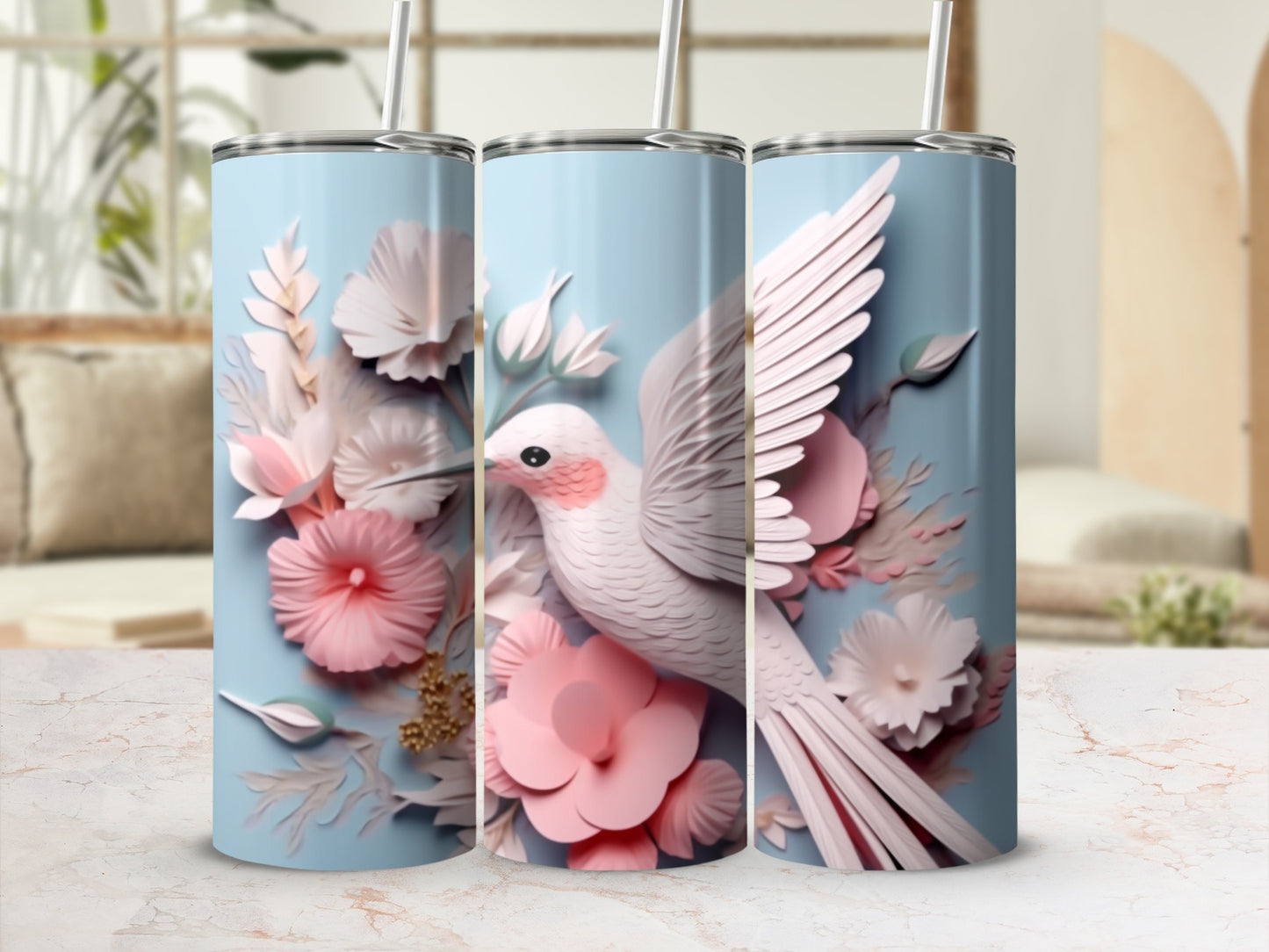 Light blue tumbler with white bird and pink flowers design.