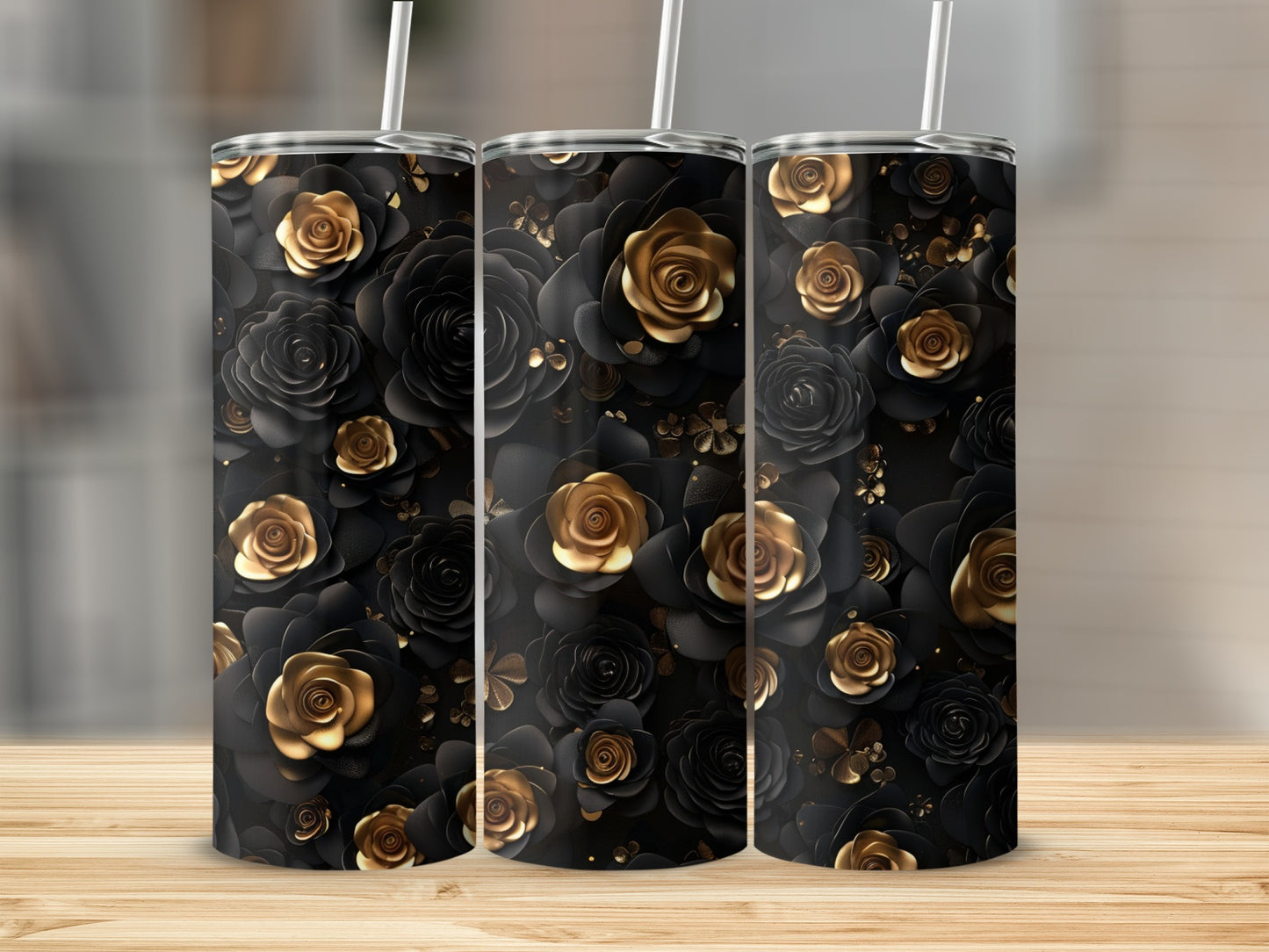 Three tumblers with a black and gold rose floral pattern.