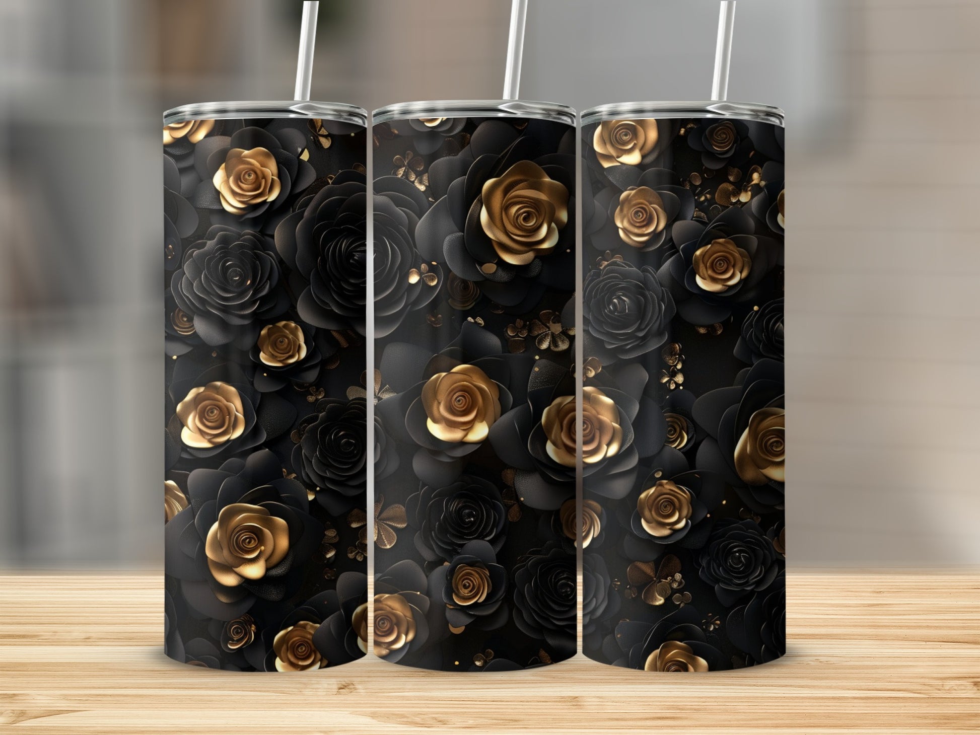 Three tumblers with a black and gold rose floral pattern.
