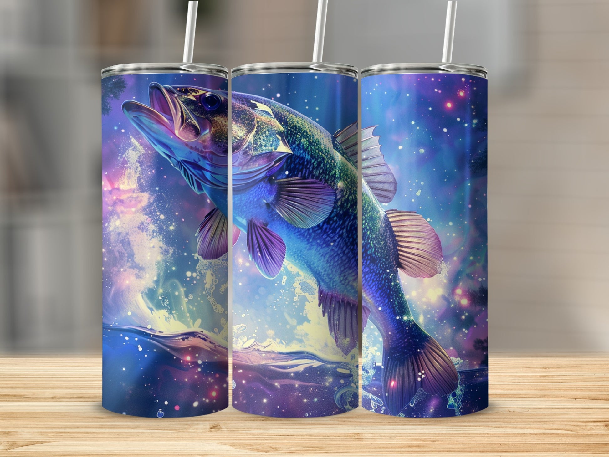 Bass fish leaping from colorful cosmic water splash, printed on three tumblers.