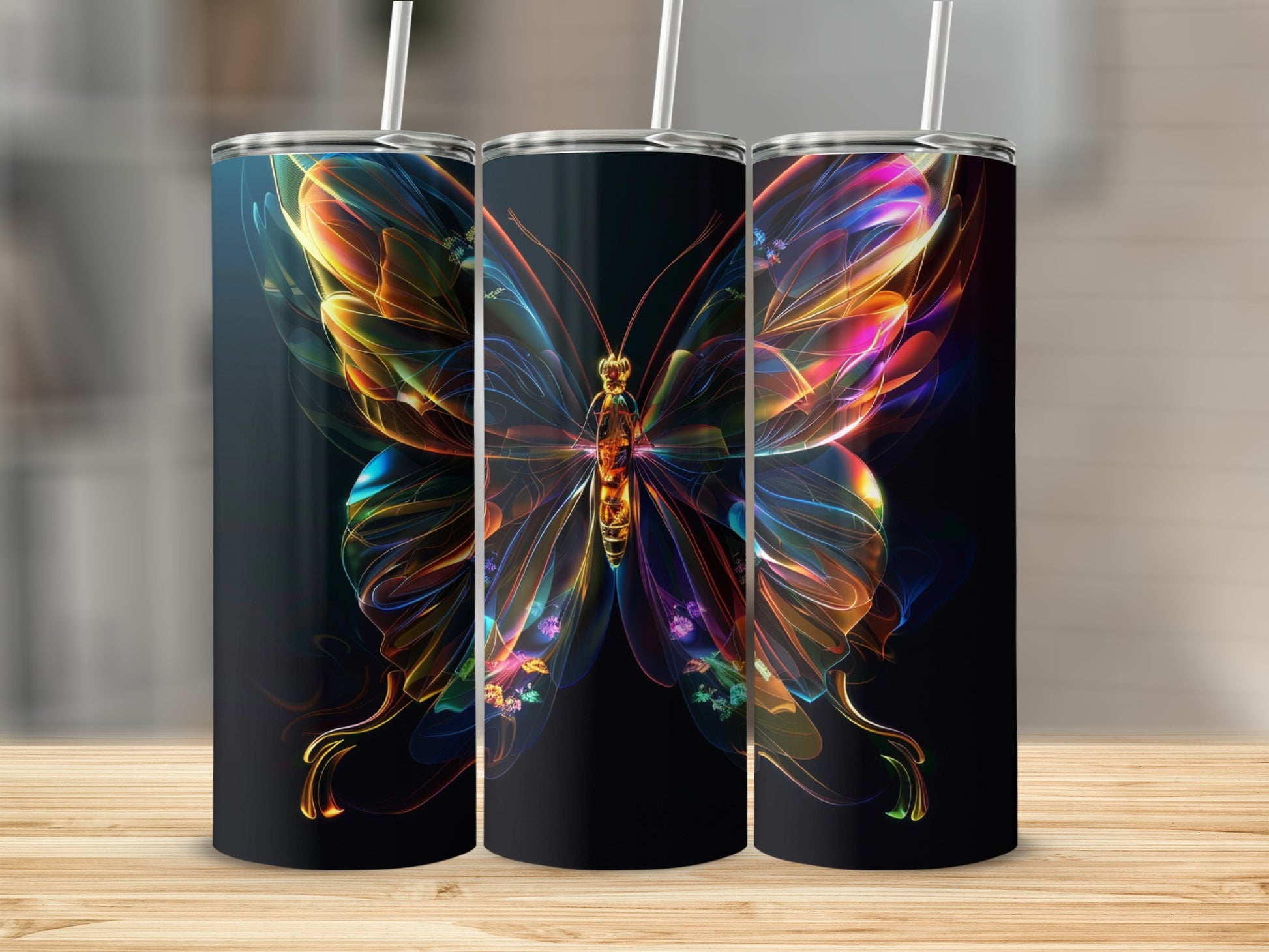 Three tumblers displaying a colorful, abstract butterfly design.