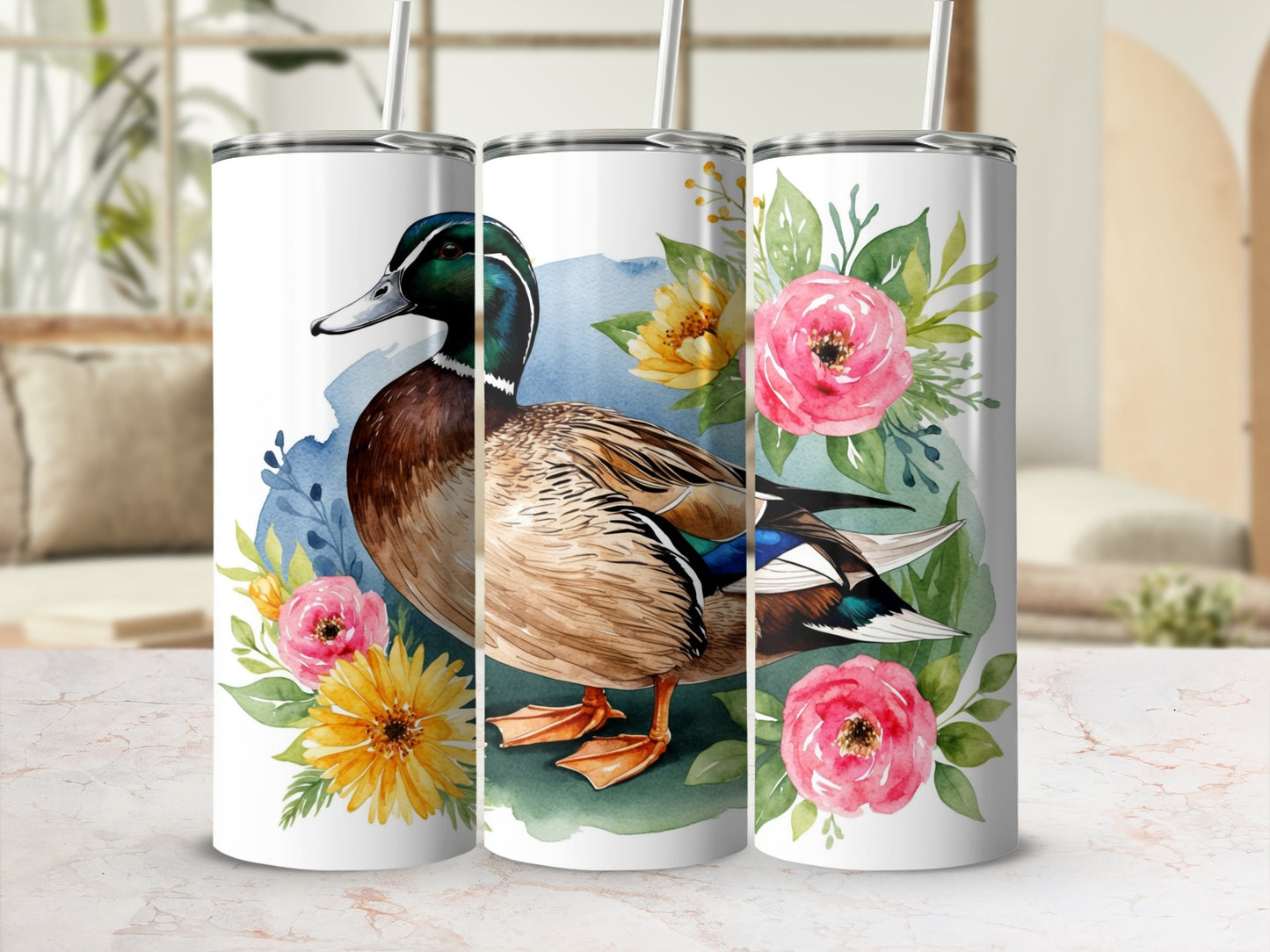 Mallard duck with pink and yellow floral accents on a white tumbler.