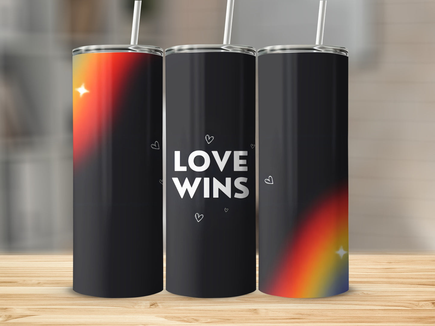 Black tumbler with rainbow gradient and "Love Wins" text.