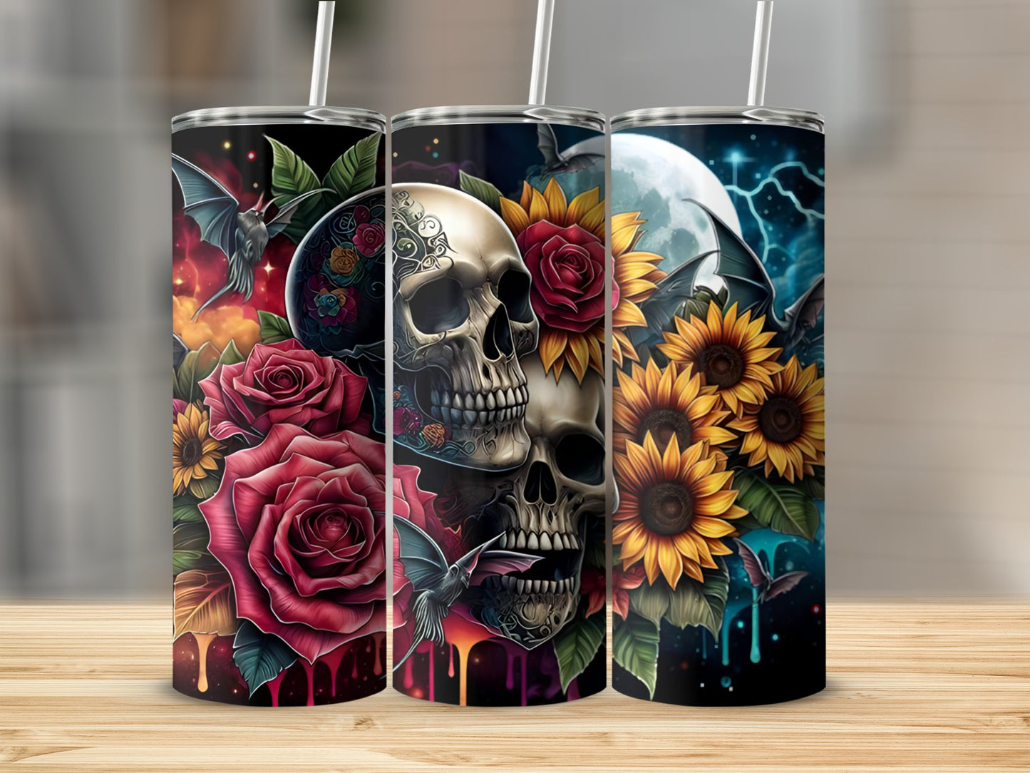 Skulls and roses with sunflowers and bats on three patterned tumblers.