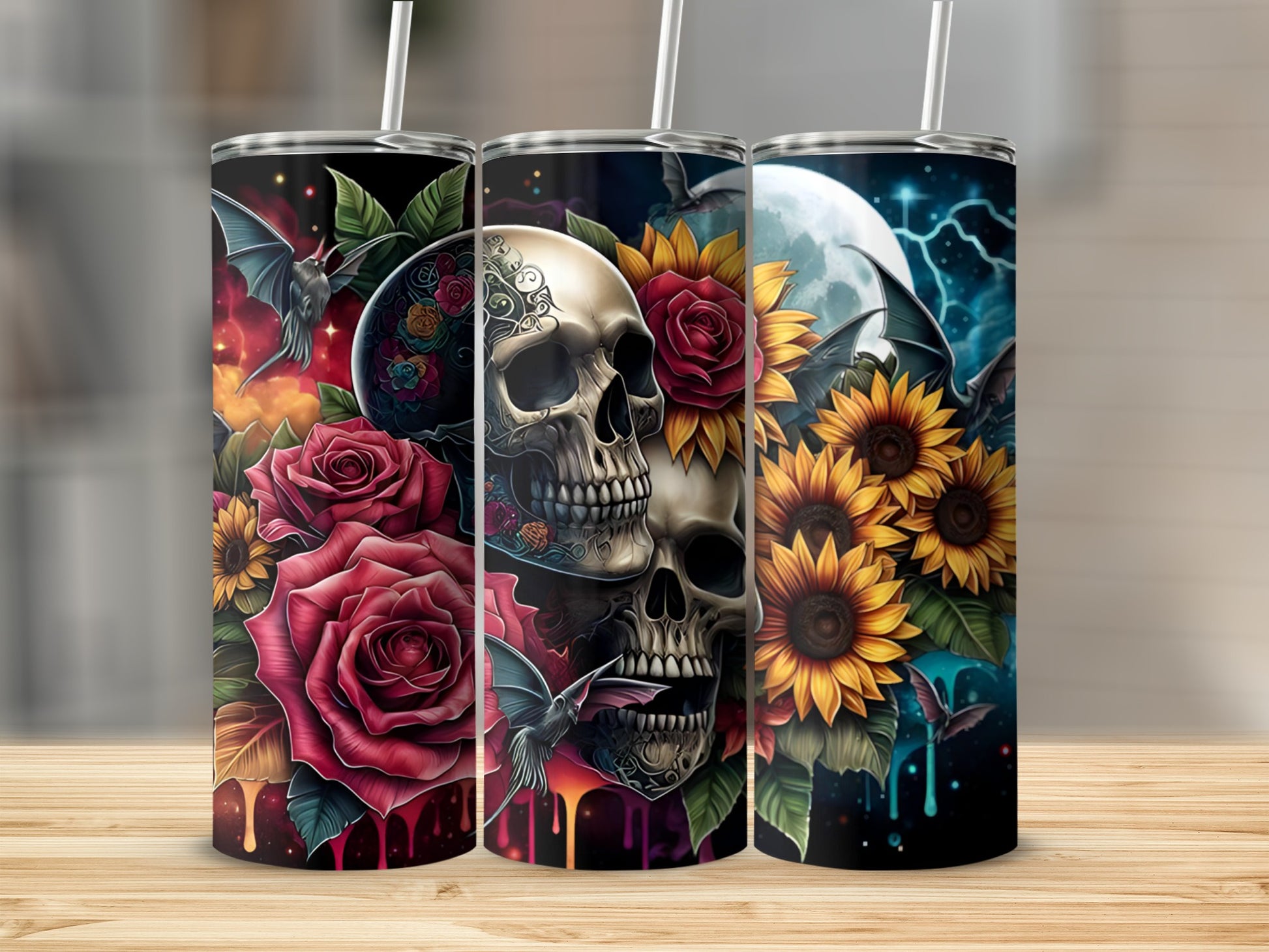 Skulls and roses with sunflowers and bats on three patterned tumblers.