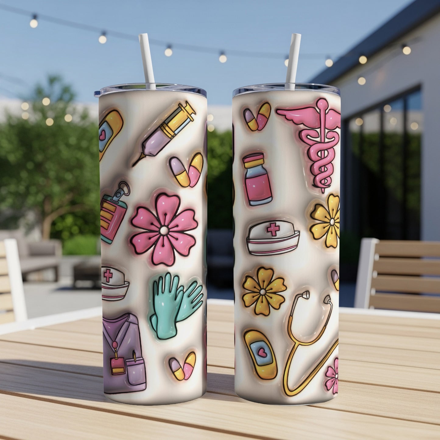 Two tumblers with medical icons and floral accents on a table.