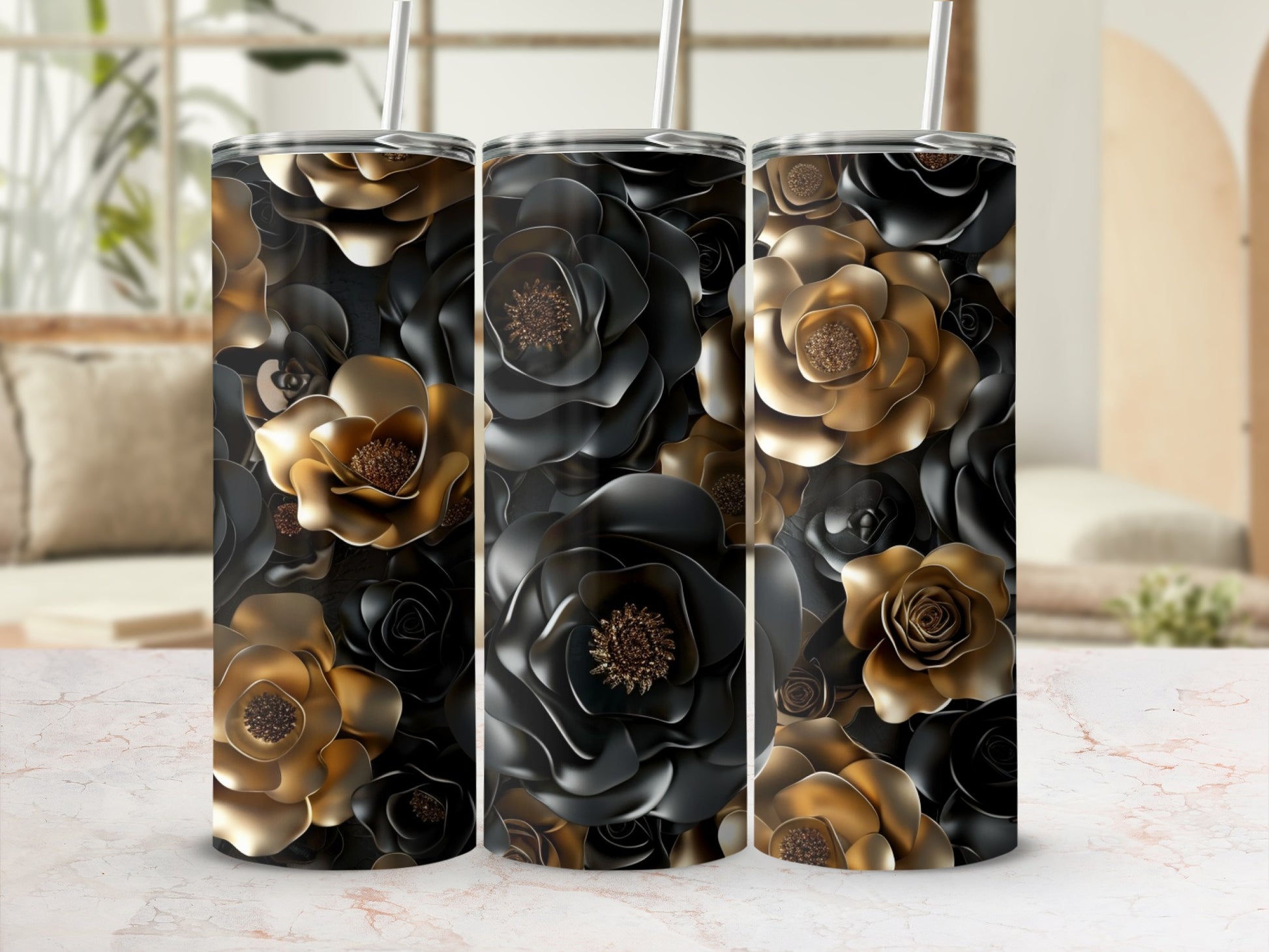 Triptych of tumblers with black and gold floral design.