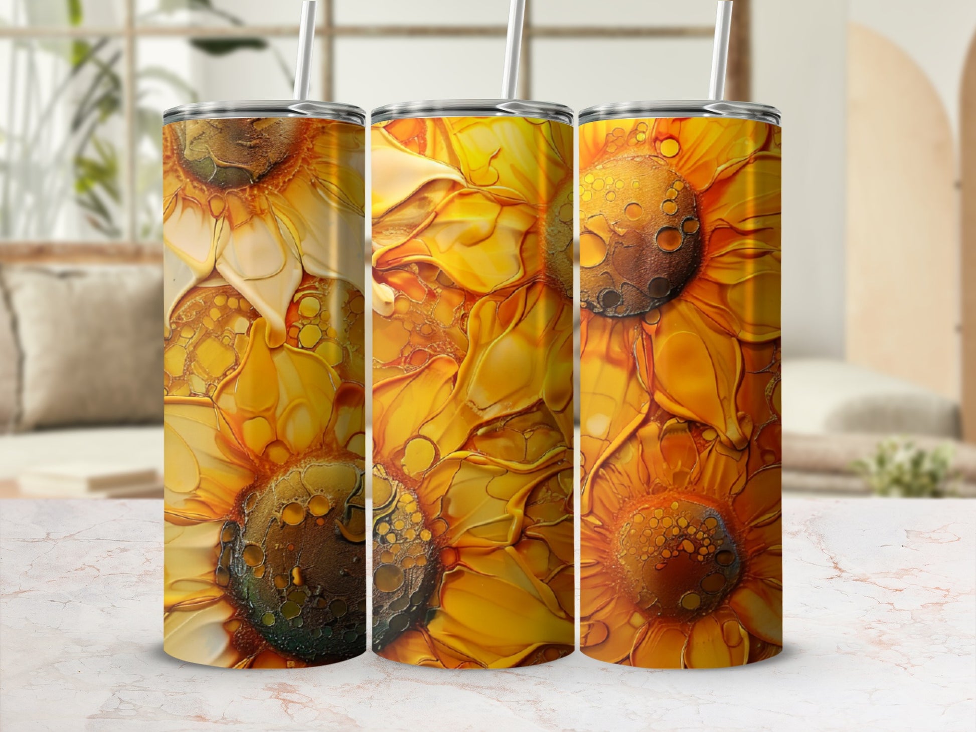 Three tumblers with a golden sunflower petal pattern.