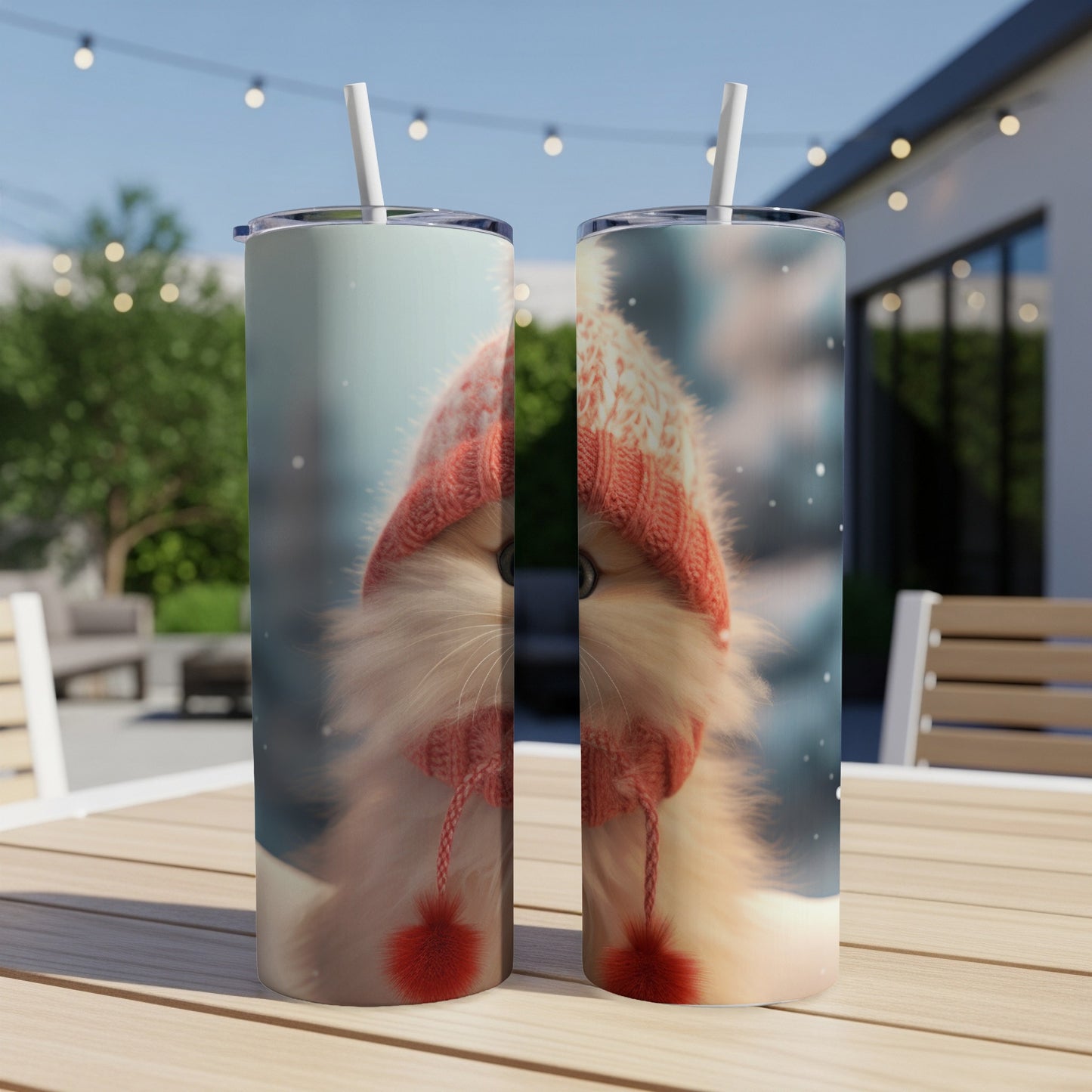 Two tumblers with fluffy cat wearing a knit hat and pom-poms.