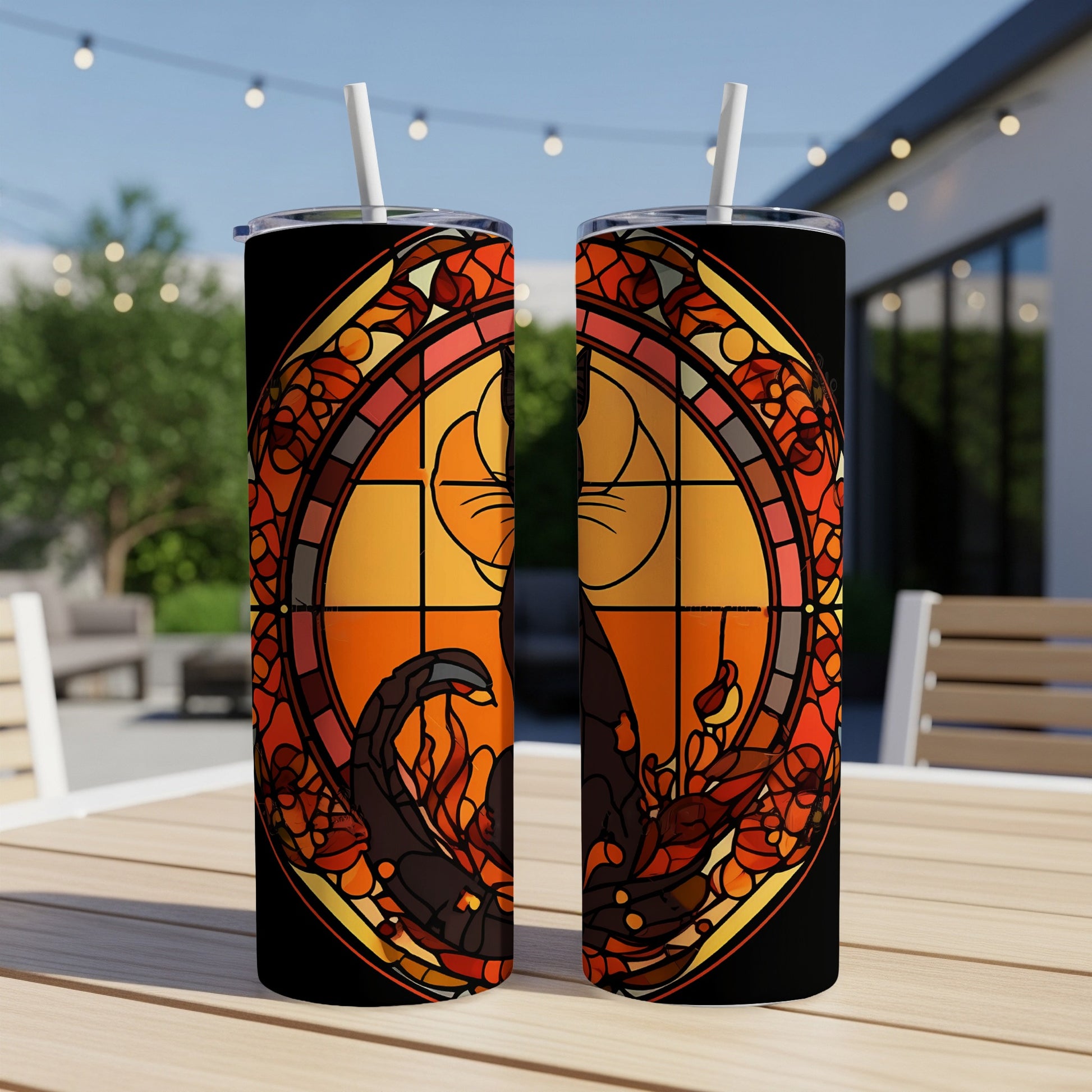 Two tumblers with stained glass art of a black cat in a moonlit, fiery scene.