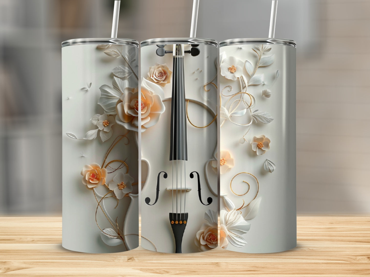 Three tumblers with a floral violin design.