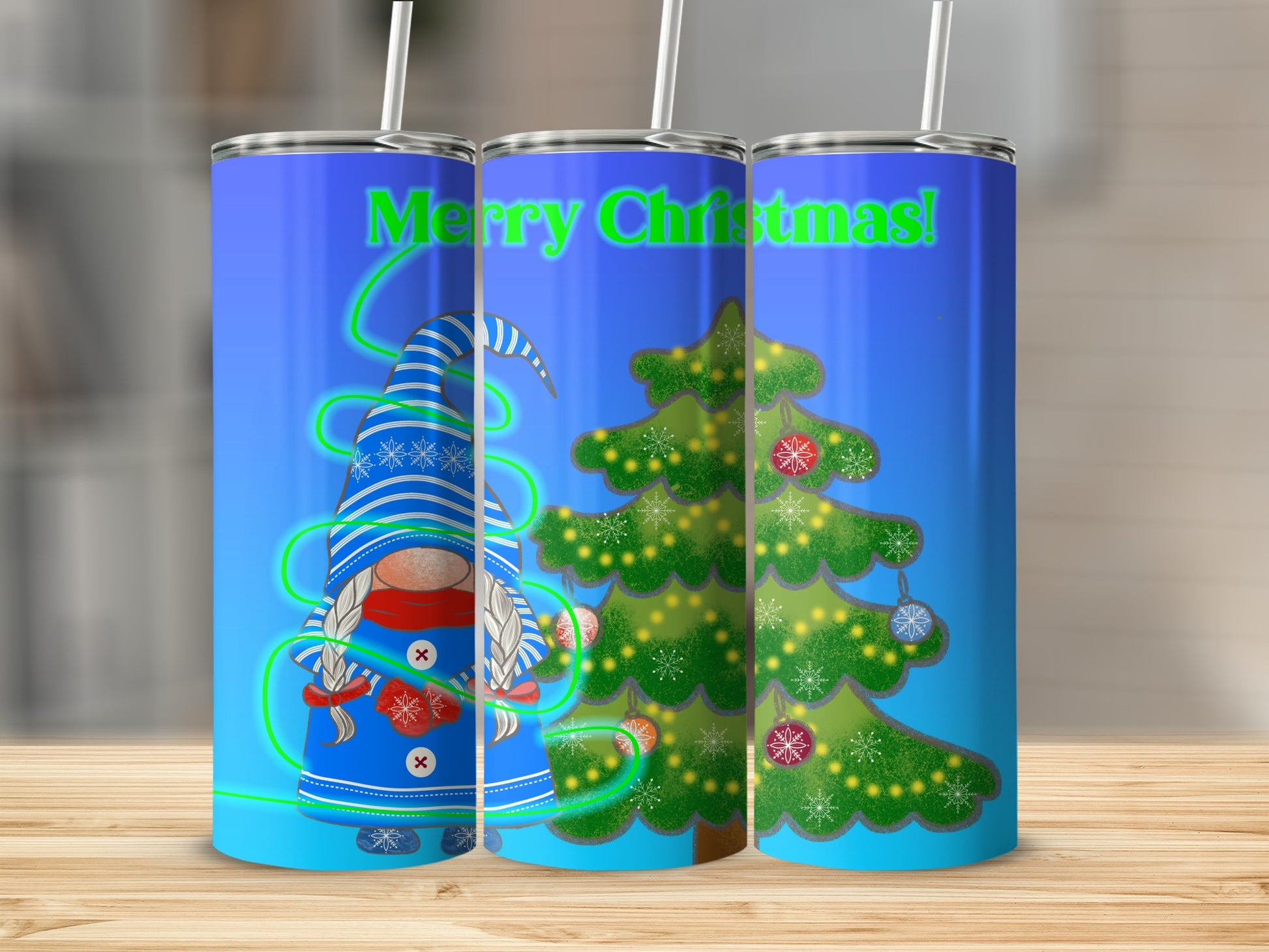 Blue tumbler with gnome, Christmas tree, and "Merry Christmas!" text.