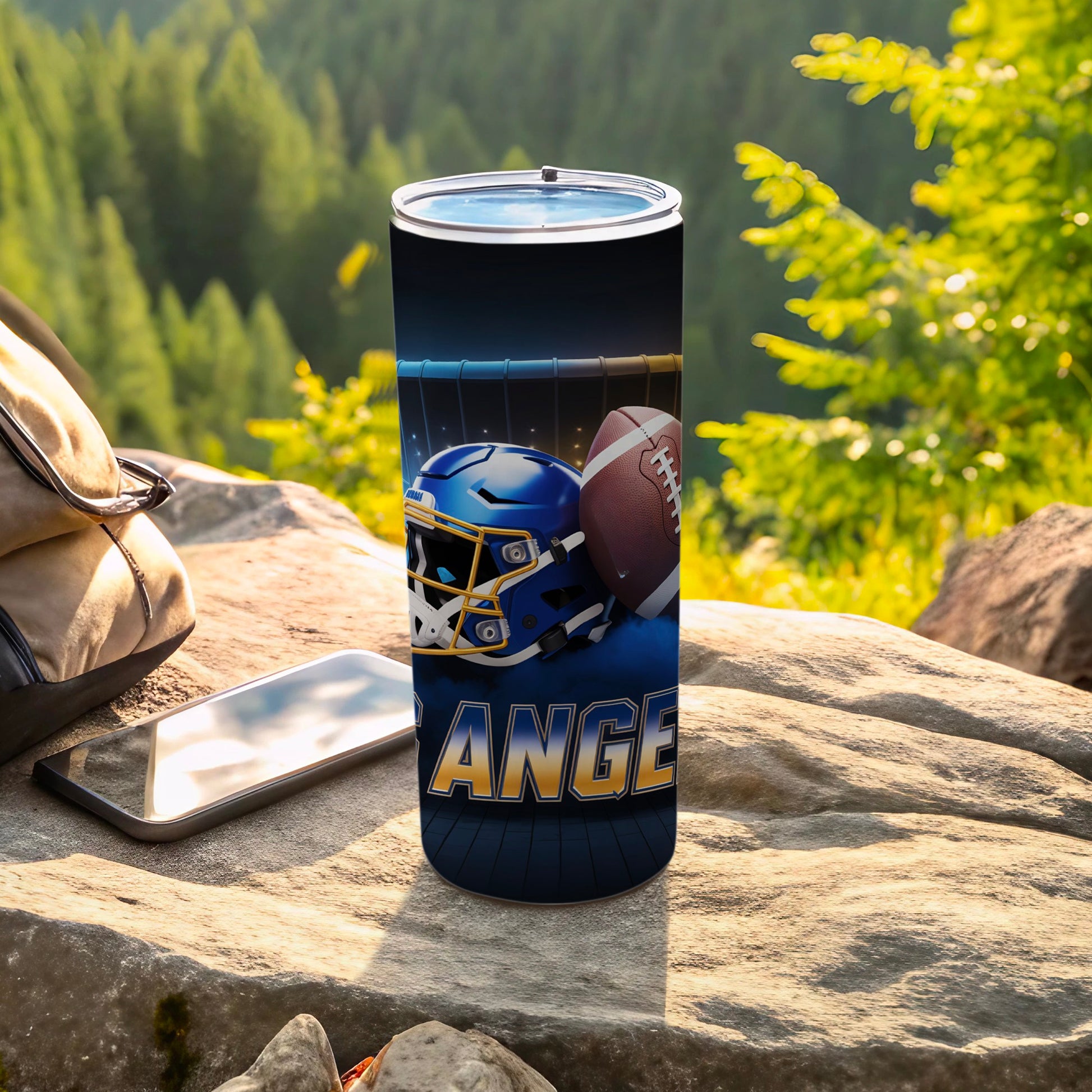 Blue and gold football helmet and ball on a tumbler with "RANGERS" text.