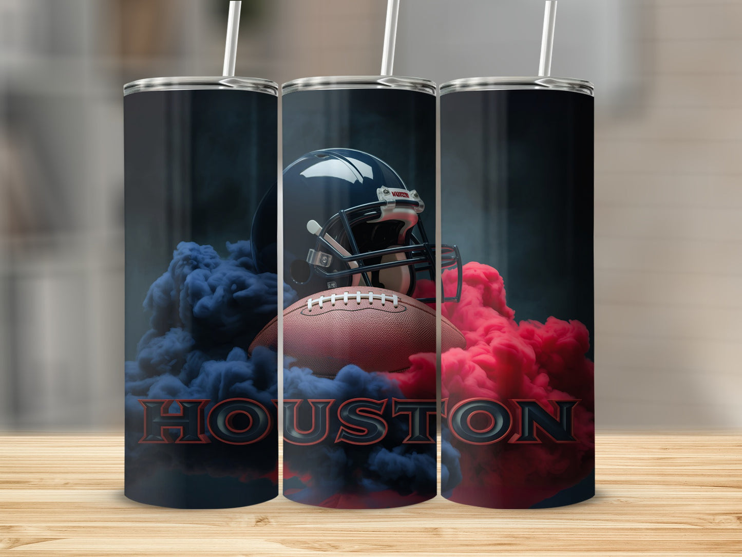 Houston football helmet, ball, and smoke on tumblers.