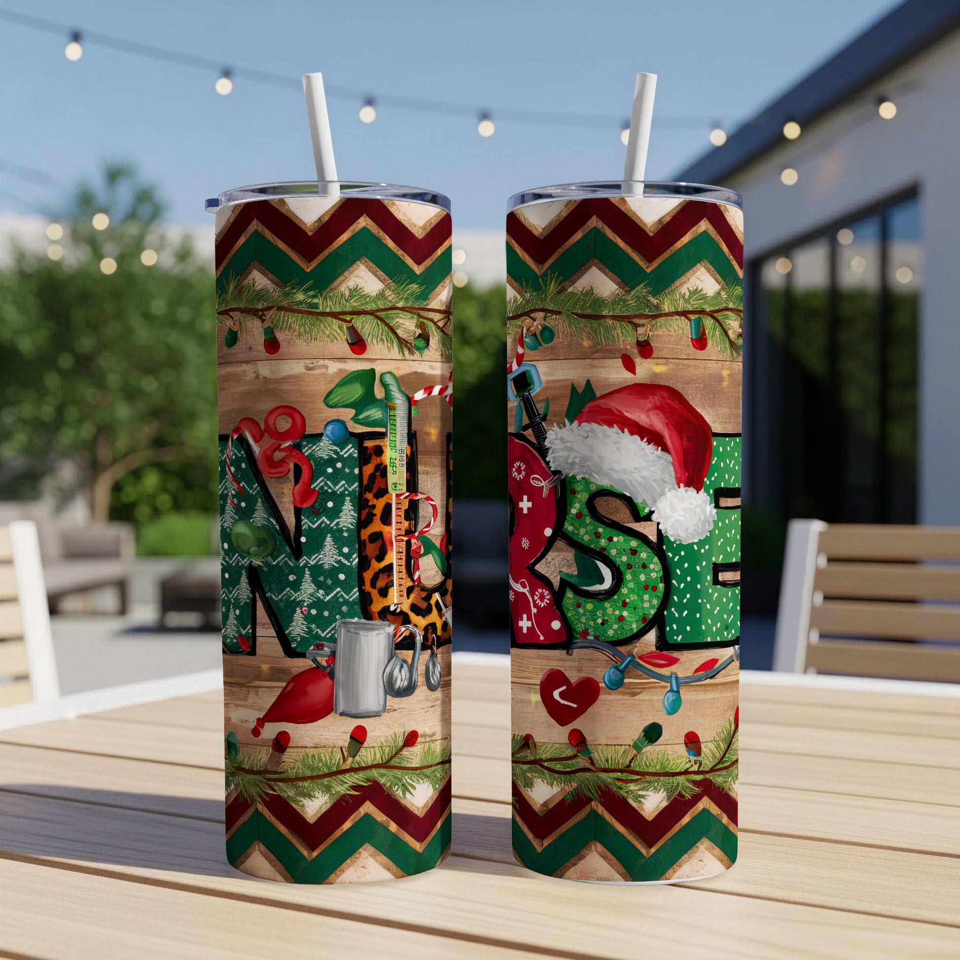 Two nurse-themed tumblers with Christmas lights and Santa hat on a wooden table.