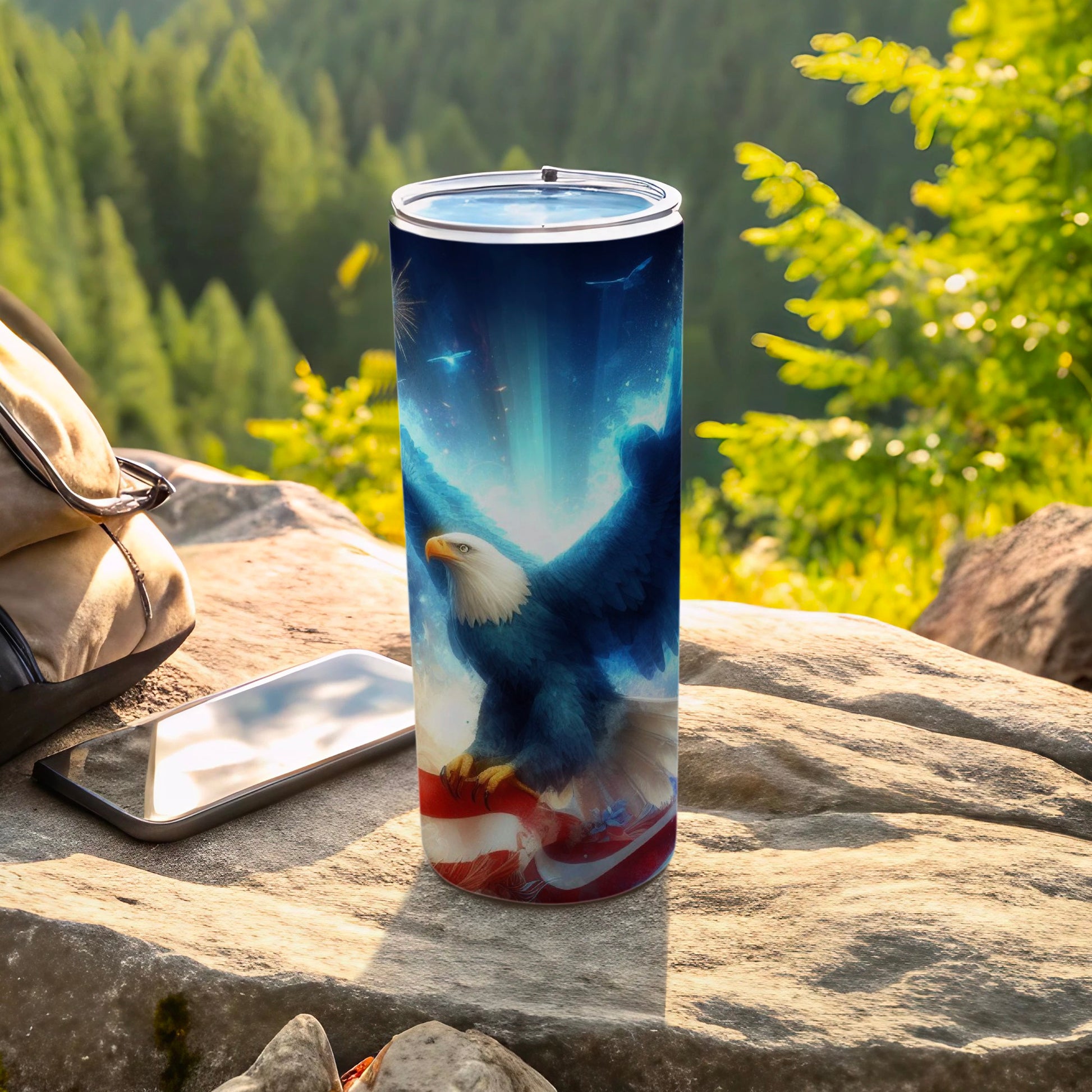 Eagle with American flag art on a blue starry background on a tumbler.