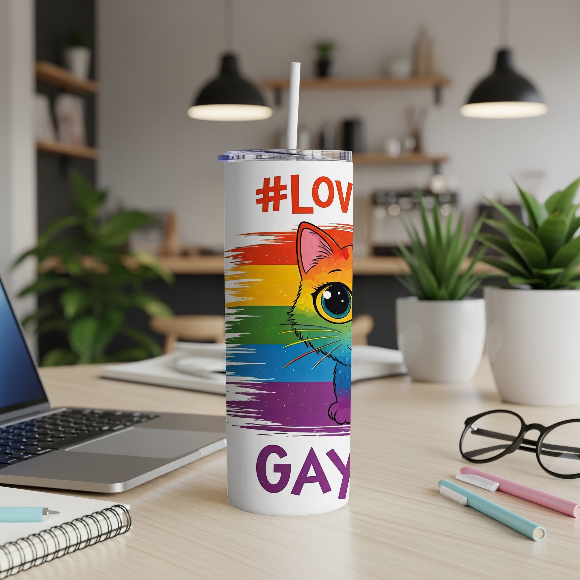 Tumbler with rainbow cat graphic and #LOVE GAY text.