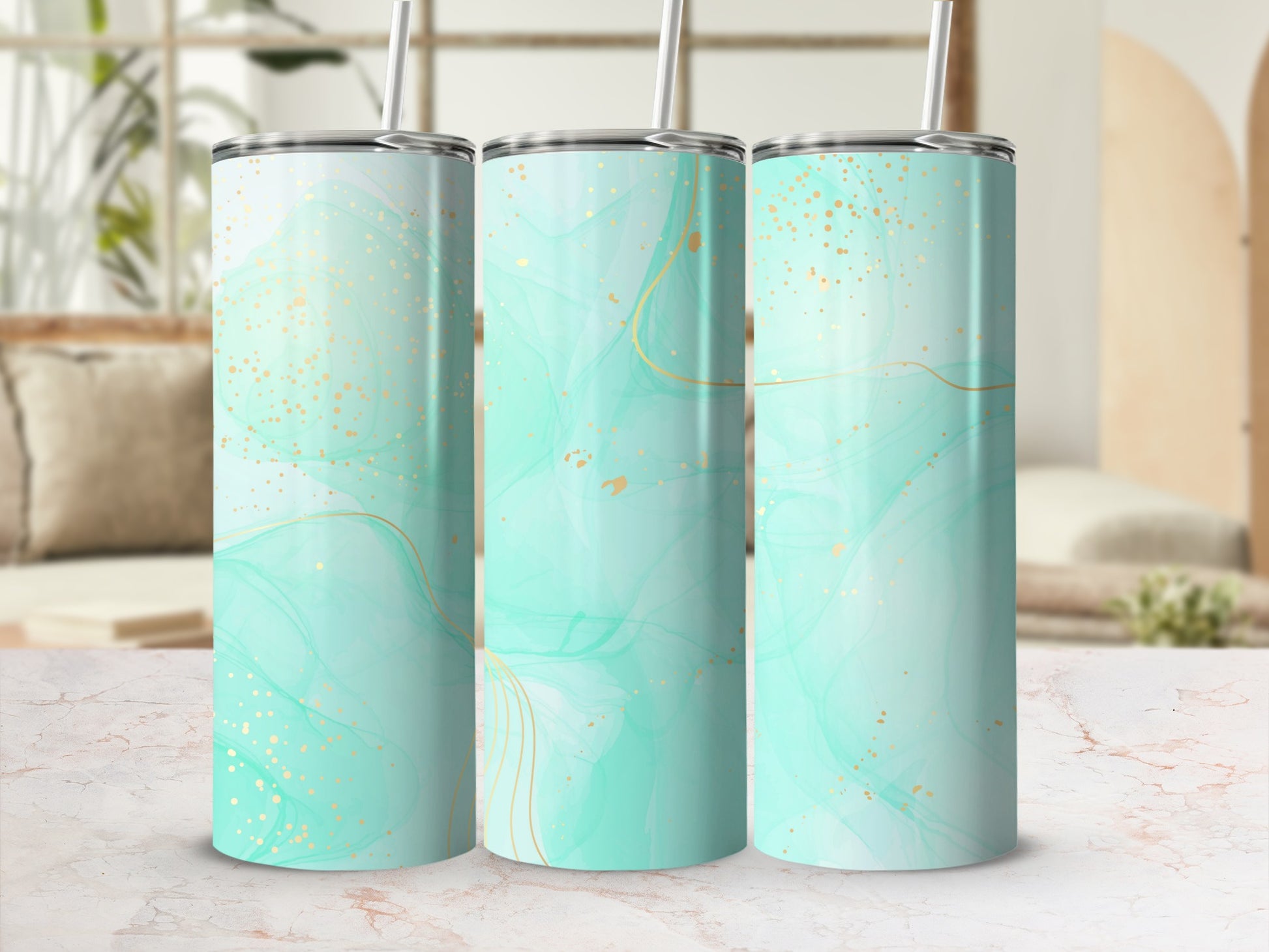 Three tumblers with a marbled mint green and gold design.