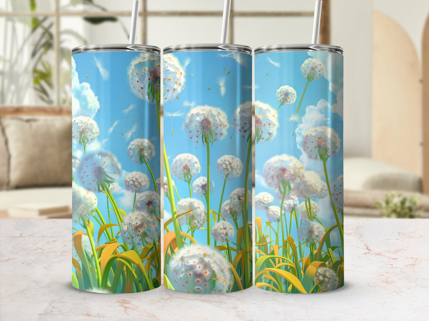 Three tumblers with a dandelion seed head design on a light background.