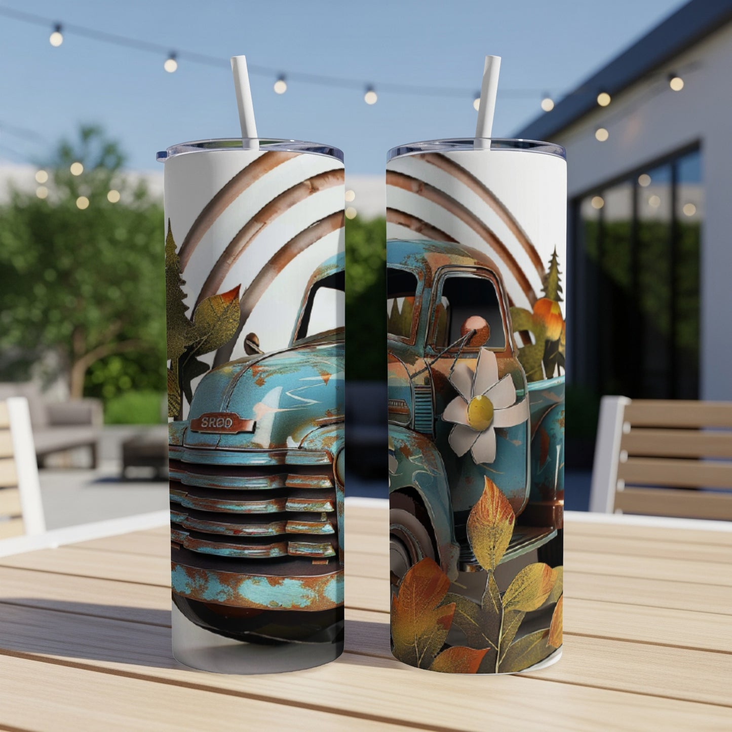 Two tumblers with a vintage blue truck and floral design.