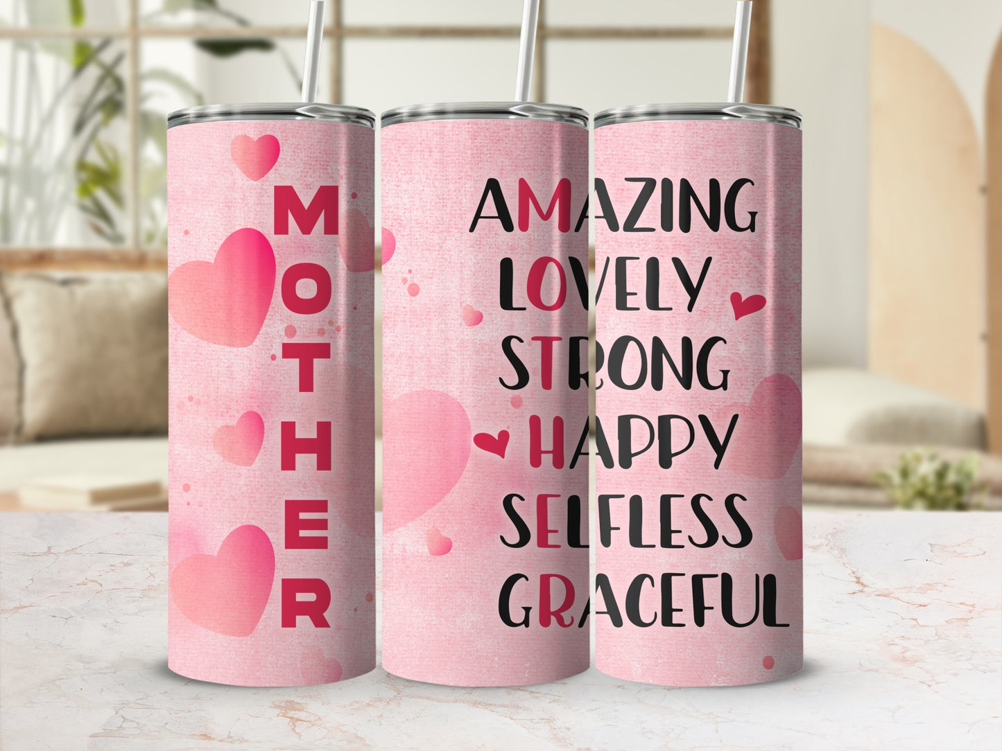 Pink tumbler with "MOTHER" on the left, and "AMAZING LOVELY STRONG HAPPY SELFLESS GRACEFUL" on the right.